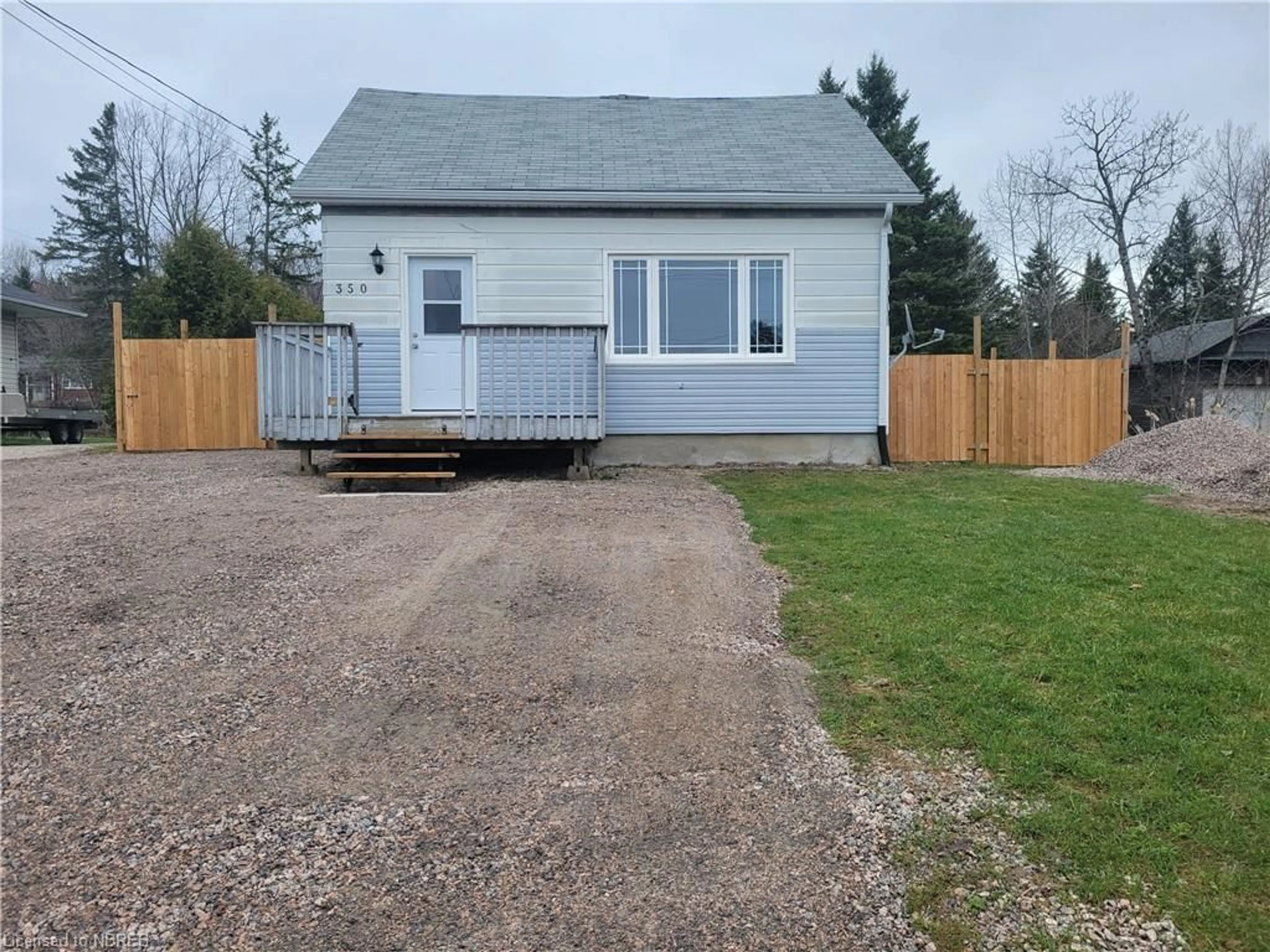 Frontside or backside of a home for 350 Main St, Powassan Ontario P0H 1Z0