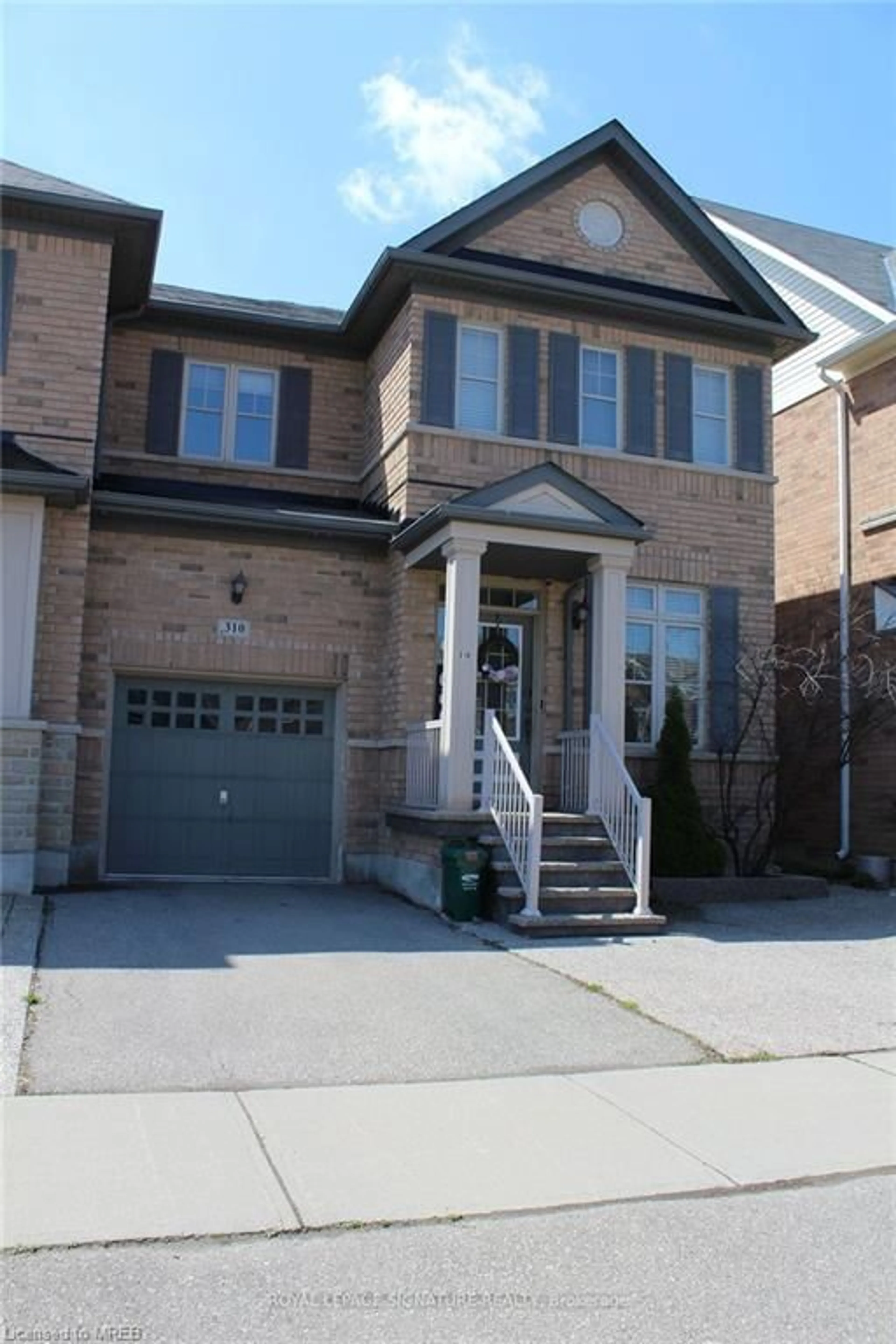 Home with brick exterior material for 310 Scott Blvd, Milton Ontario L9T 6Z9