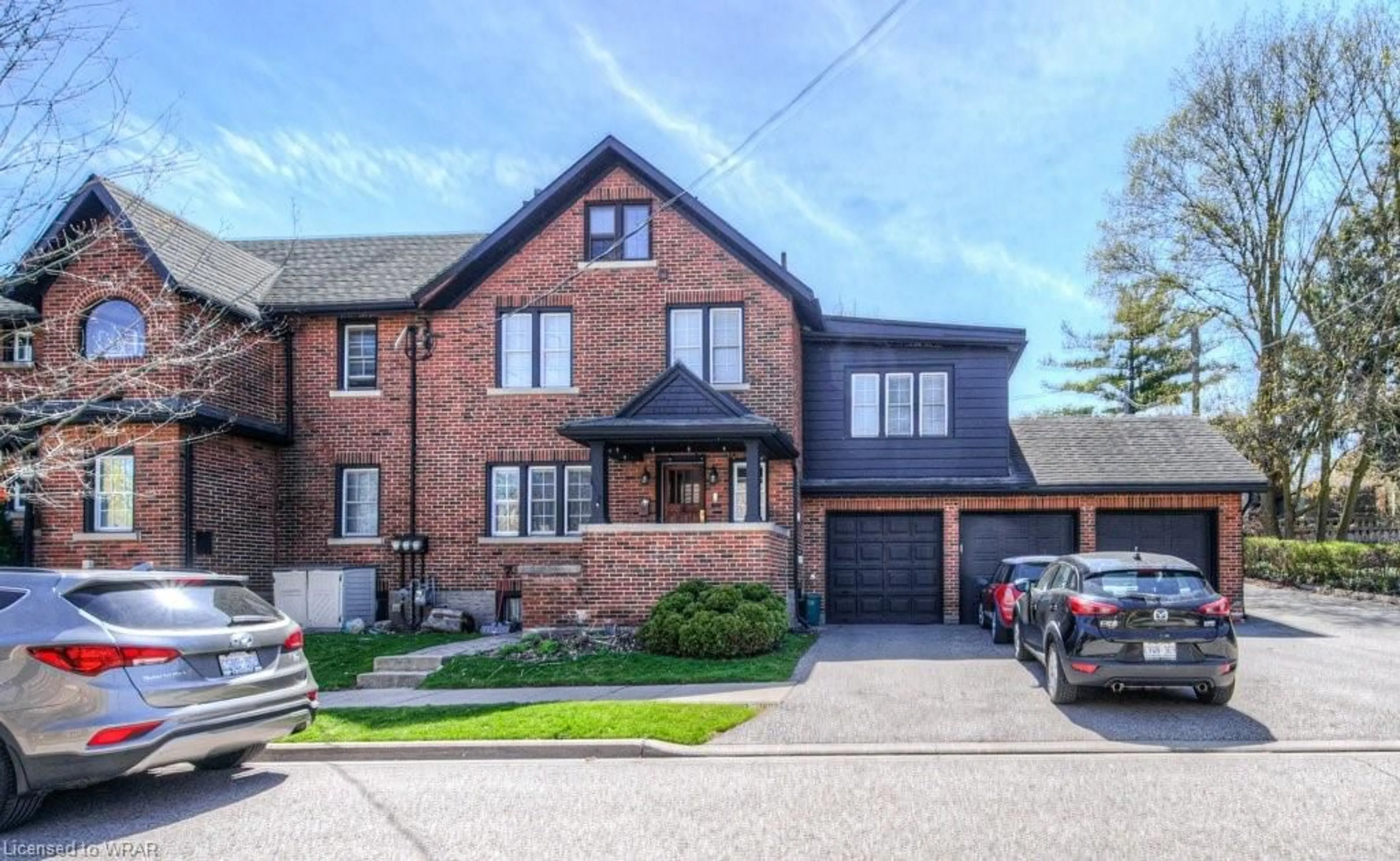 Home with brick exterior material for 84 - 88 John St, Waterloo Ontario N2L 1C1