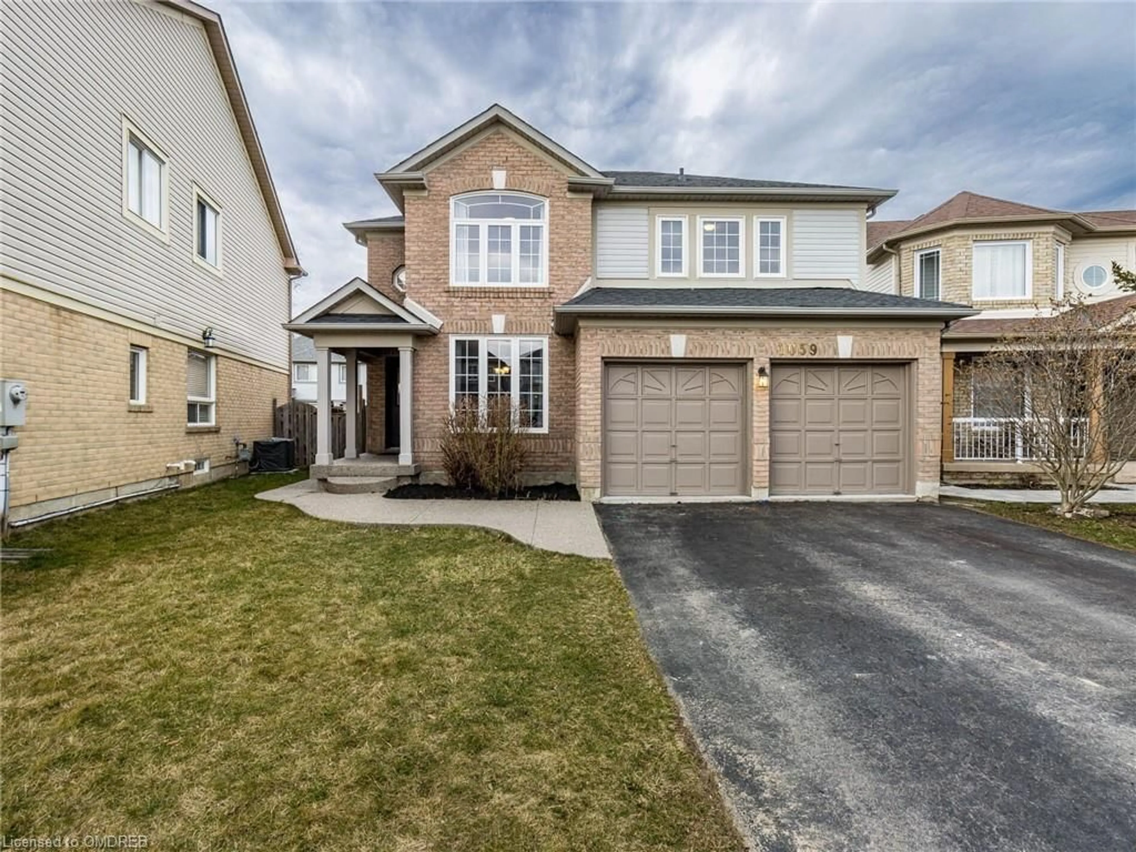 Frontside or backside of a home for 1059 Deacon Dr, Milton Ontario L9T 5S5