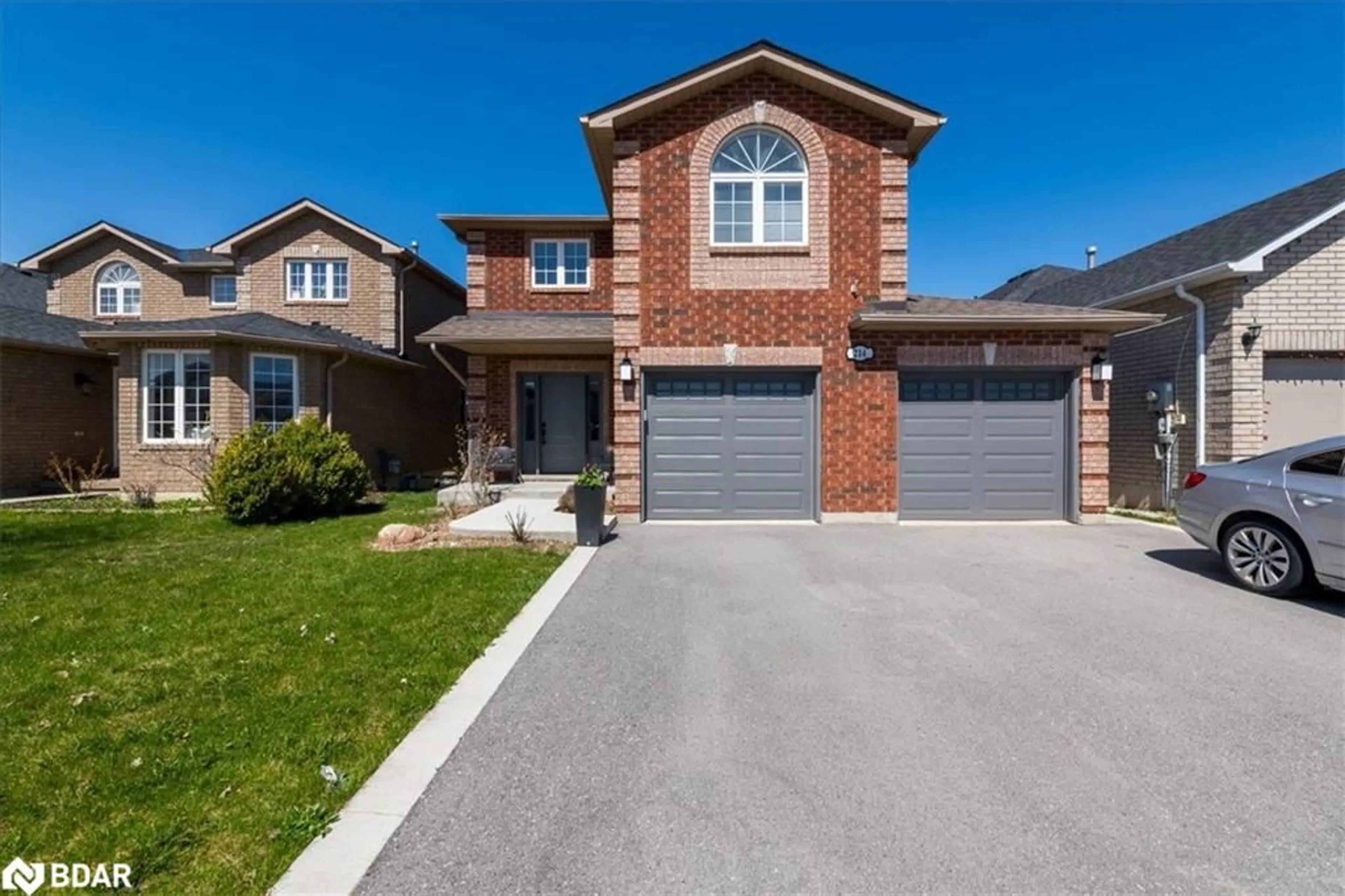 Frontside or backside of a home for 214 Country Lane, Barrie Ontario L4N 0W1