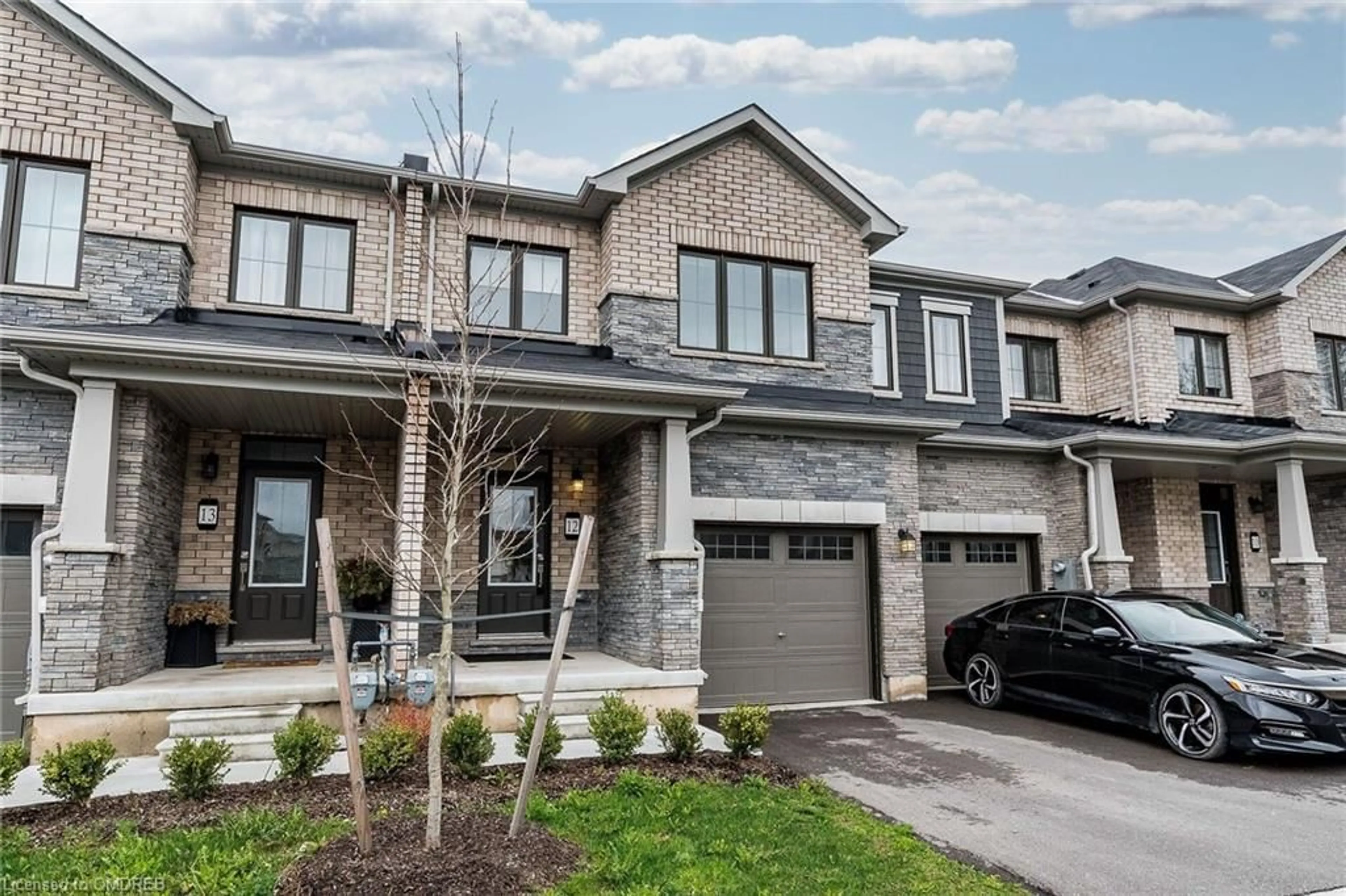 Home with brick exterior material for 8273 Tulip Tree Drive Dr #12, Niagara Falls Ontario L2H 3S8