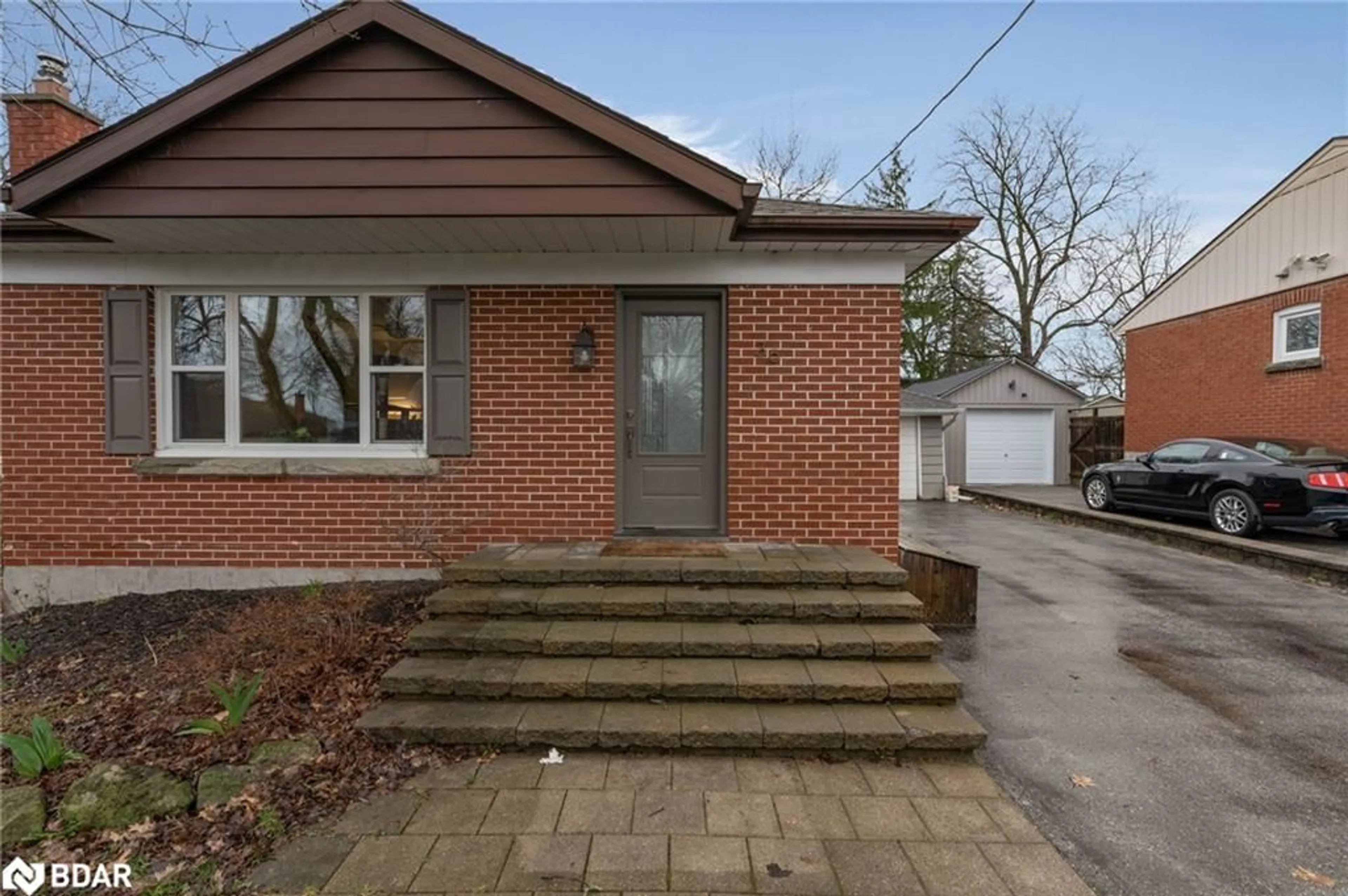 Home with brick exterior material for 36 Lount St, Barrie Ontario L4M 3E1