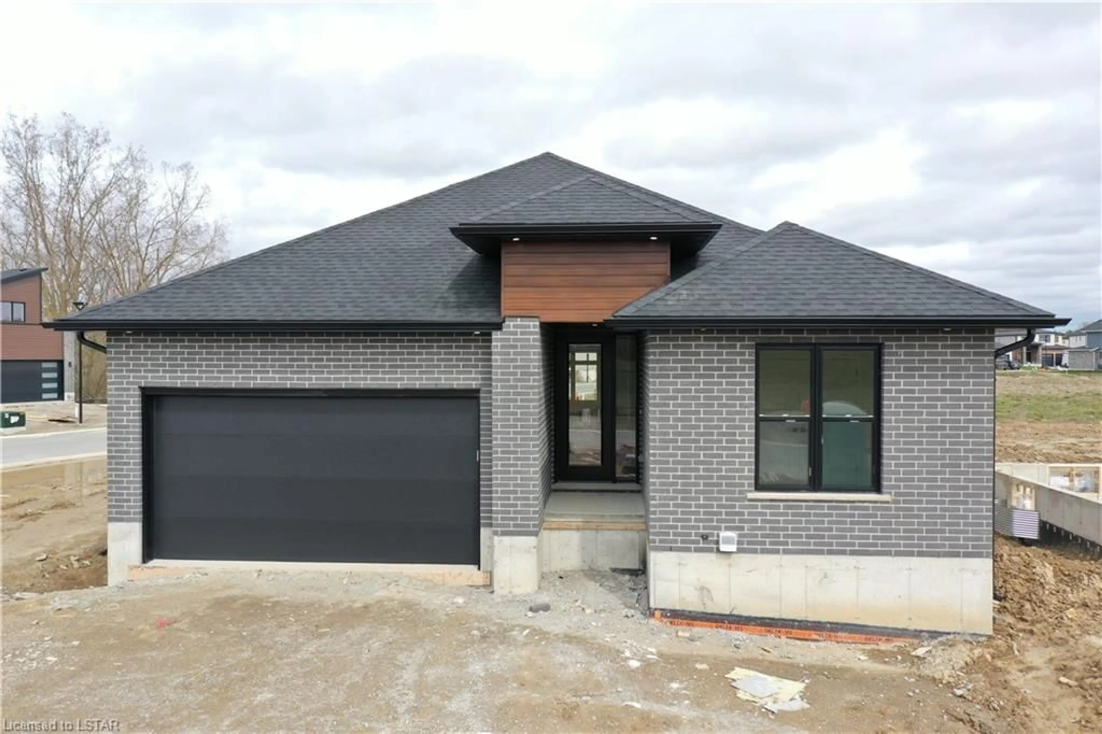 Home with brick exterior material for 141 Greene St, Exeter Ontario N0M 1S2