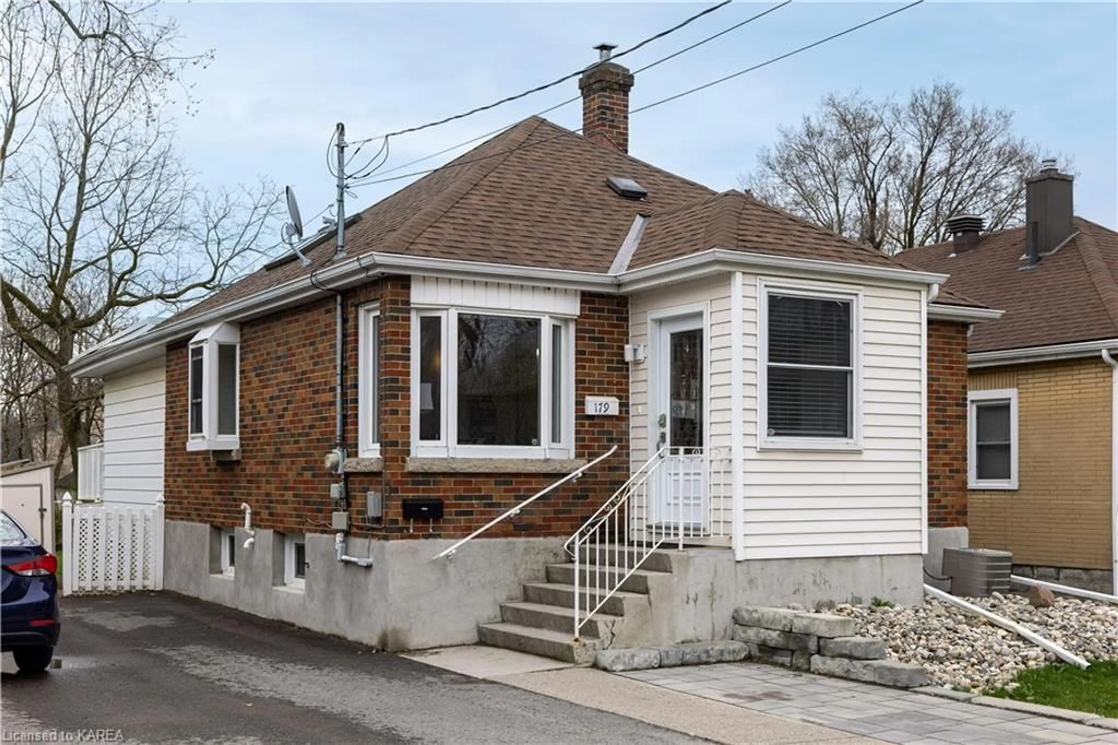 Frontside or backside of a home for 179 Toronto St, Kingston Ontario K7L 4A9