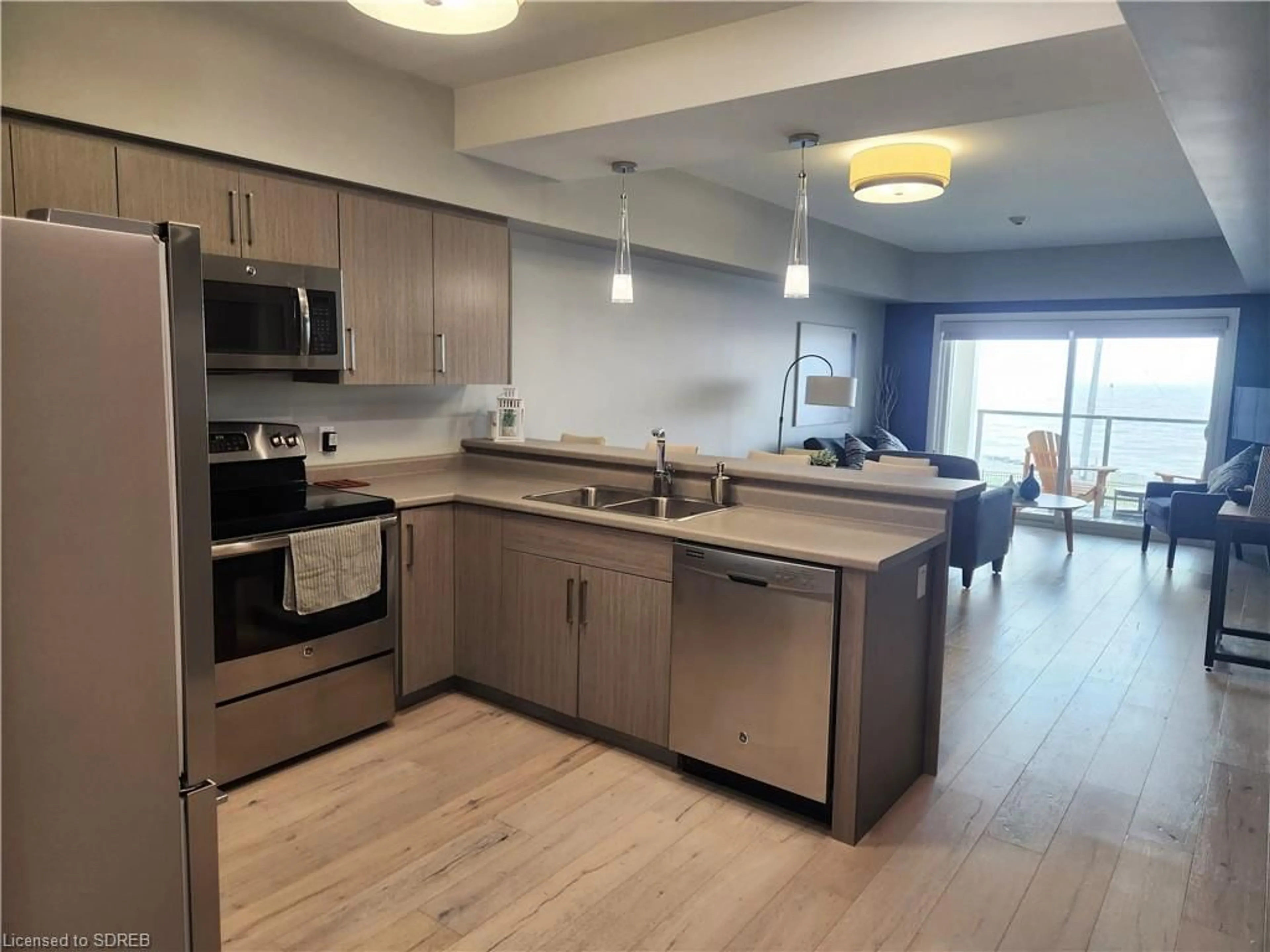 Open concept kitchen for 12 Erie Blvd #207, Port Rowan Ontario N0E 1M0