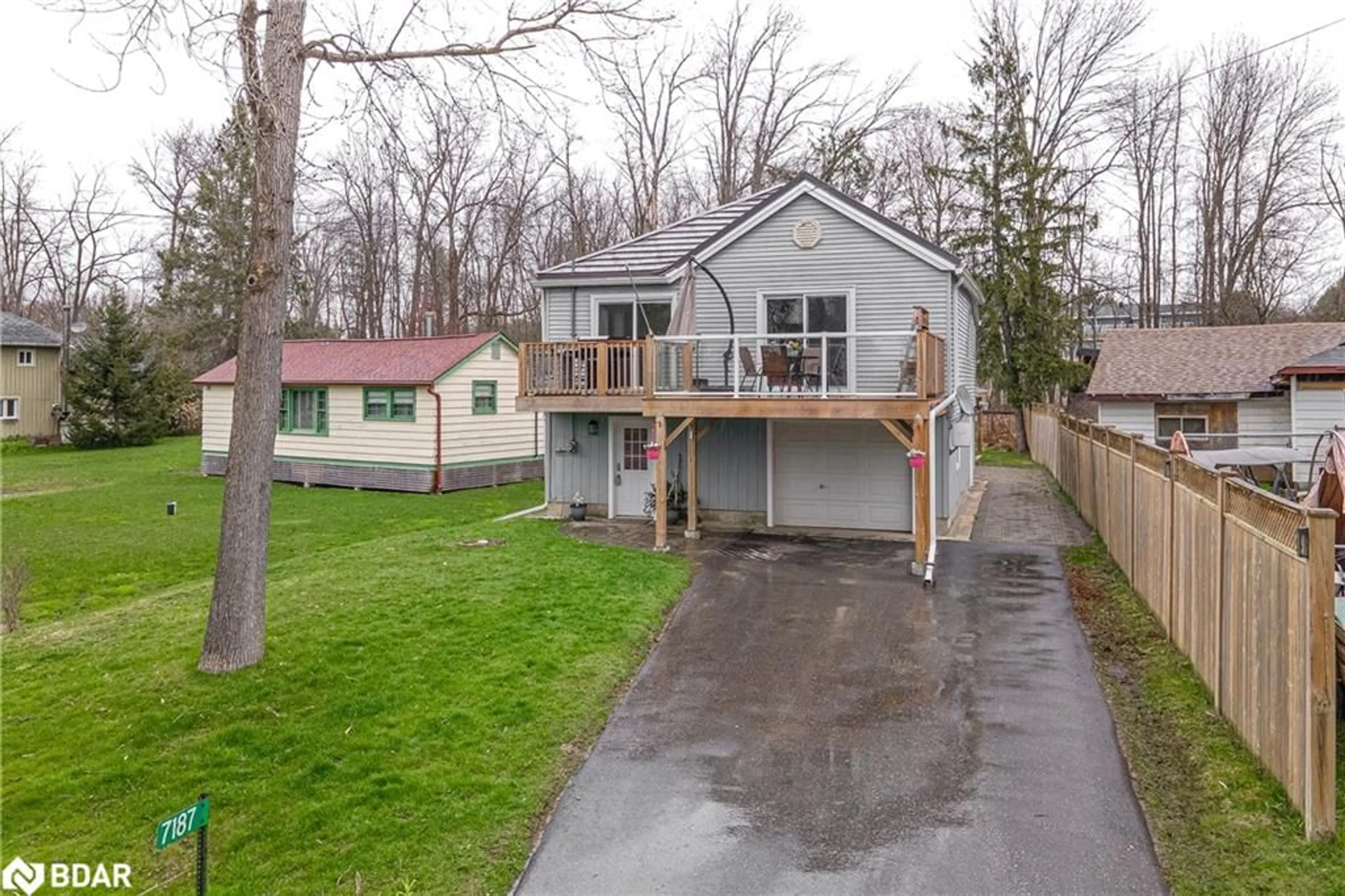 Frontside or backside of a home for 7187 Beach Dr, Washago Ontario L0K 2B0