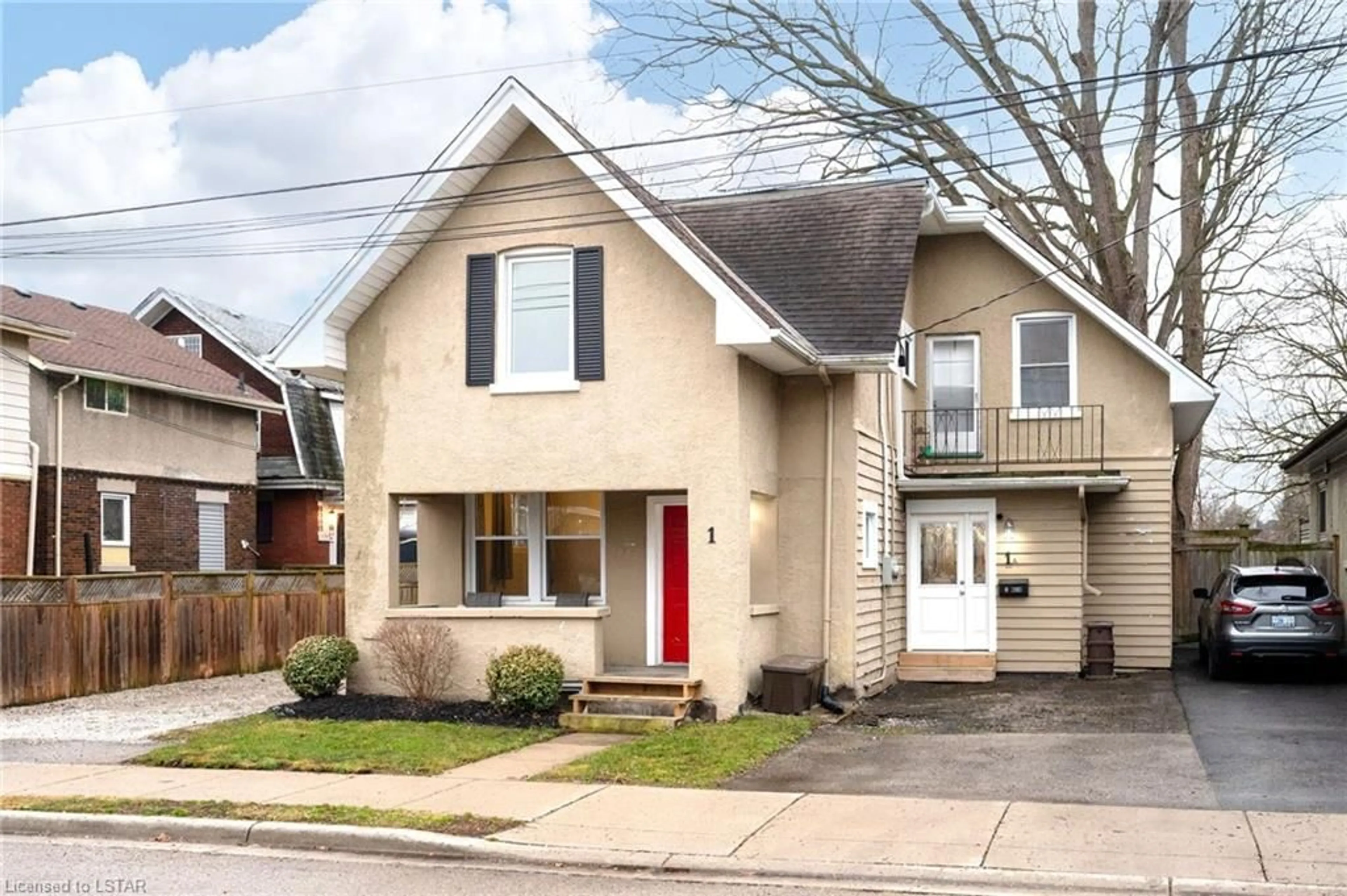 Frontside or backside of a home for 1 Erie Ave, London Ontario N6J 1H9
