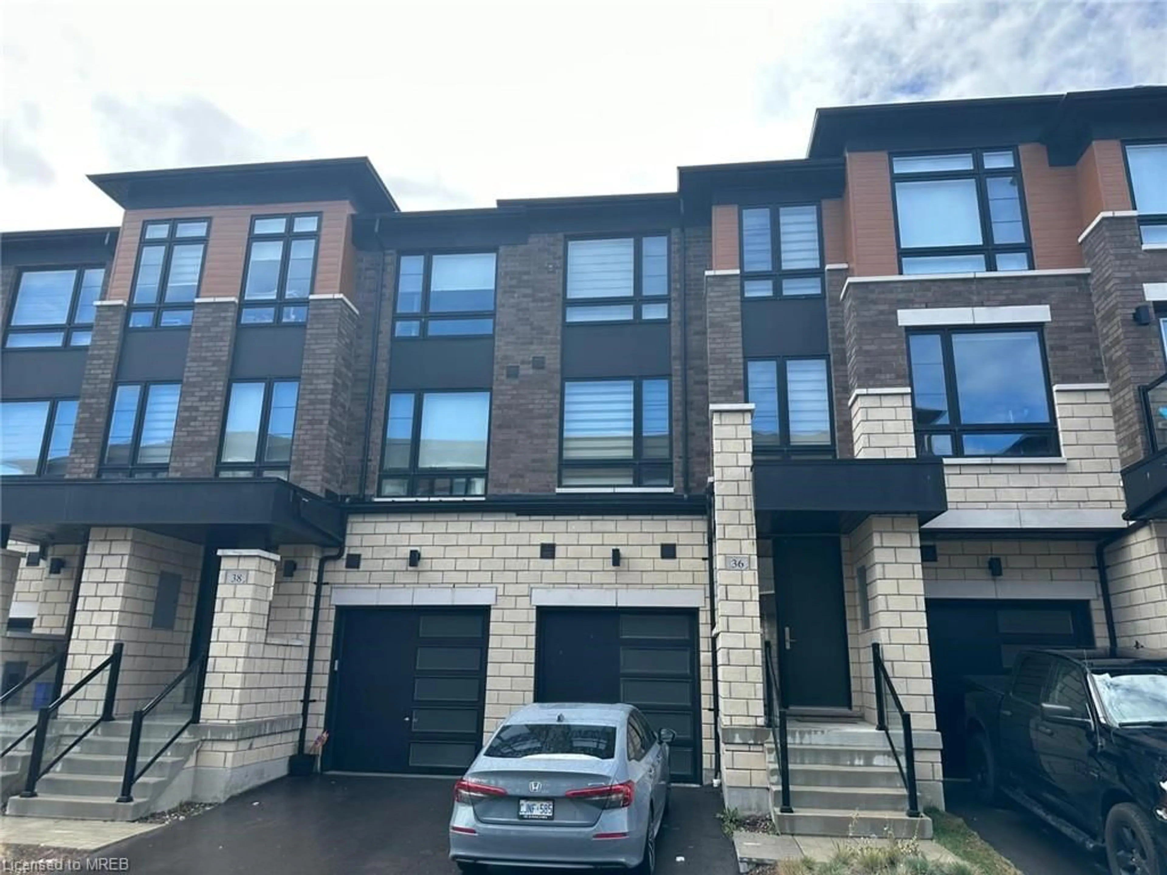 A pic from exterior of the house or condo for 36 Lake Trail Way, Whitby Ontario L1M 0E3