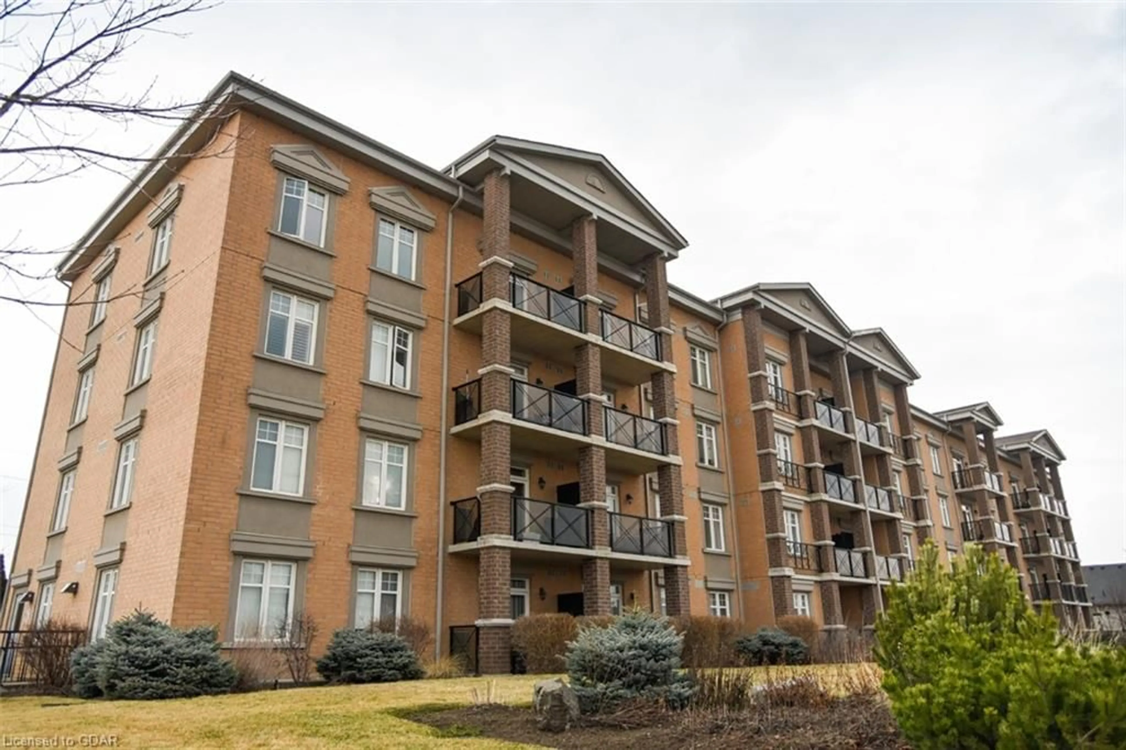 A pic from exterior of the house or condo for 2 Colonial Dr #209, Guelph Ontario N1L 0K8