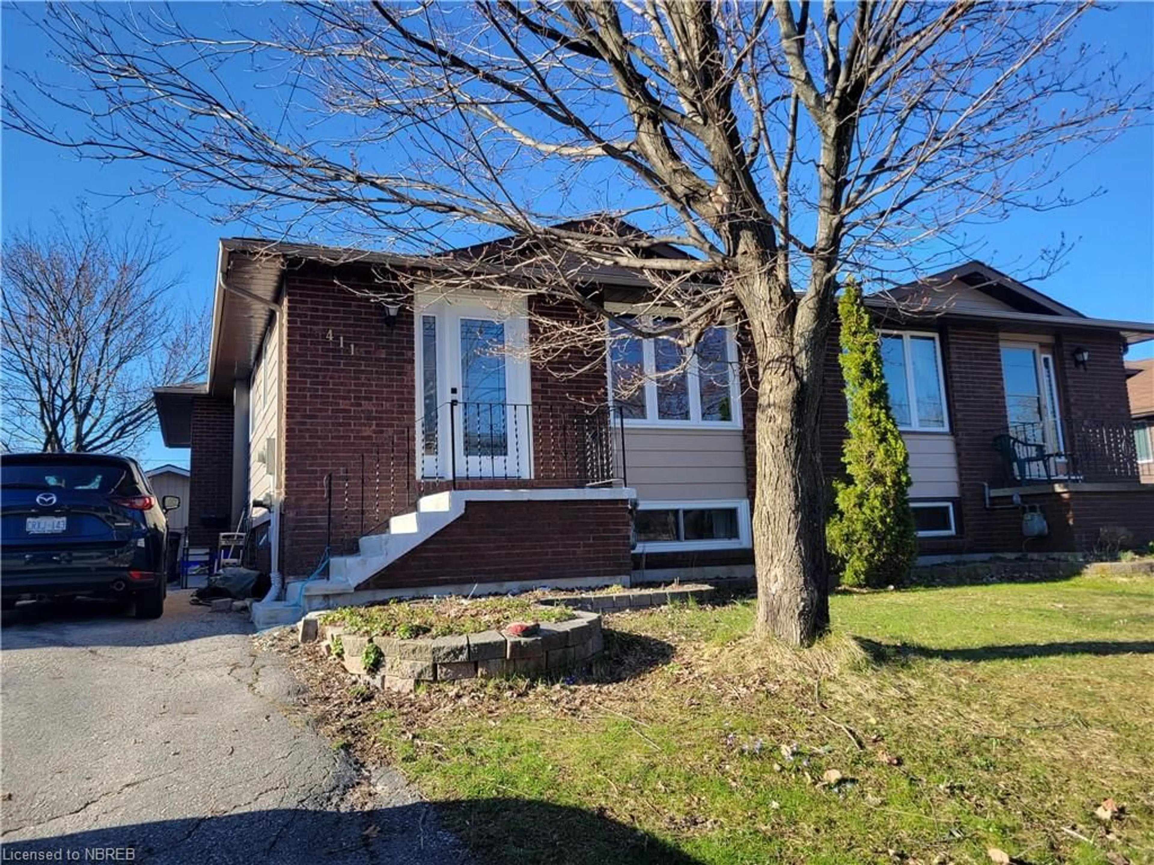 Frontside or backside of a home for 411 Wickstead Ave, North Bay Ontario P1A 4A8
