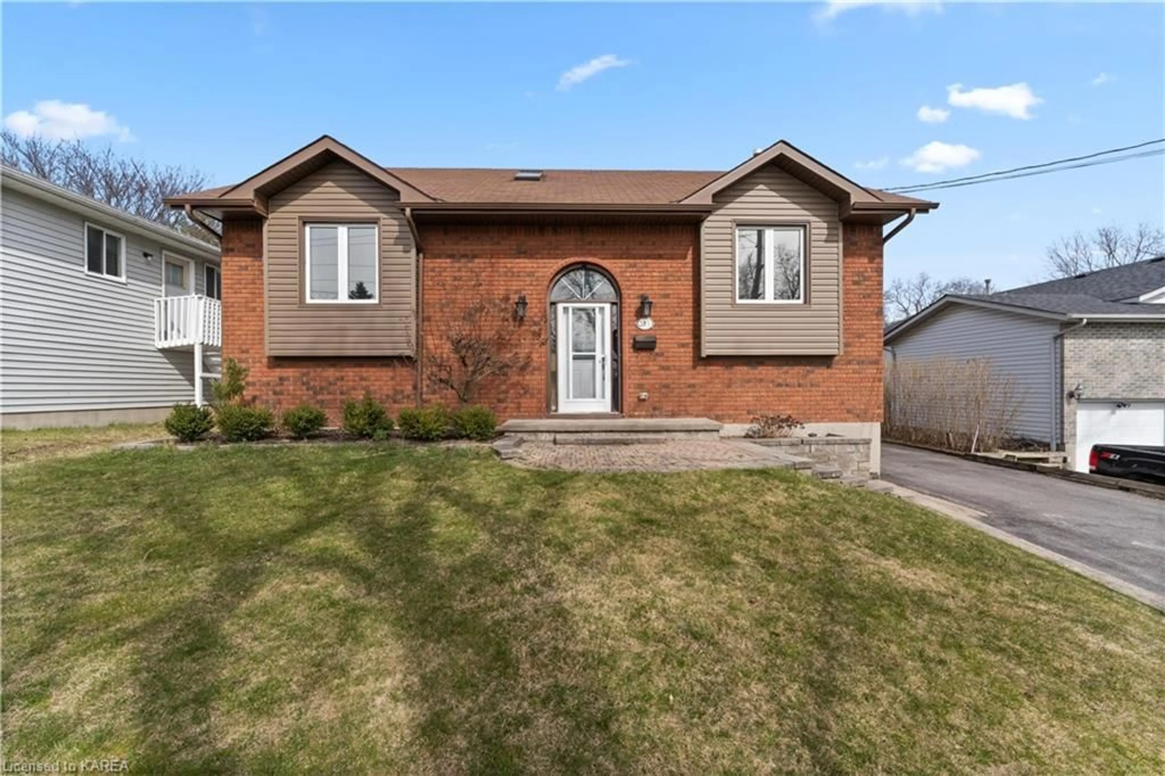 Home with brick exterior material for 315 Amherst Dr, Amherstview Ontario K7N 1V3