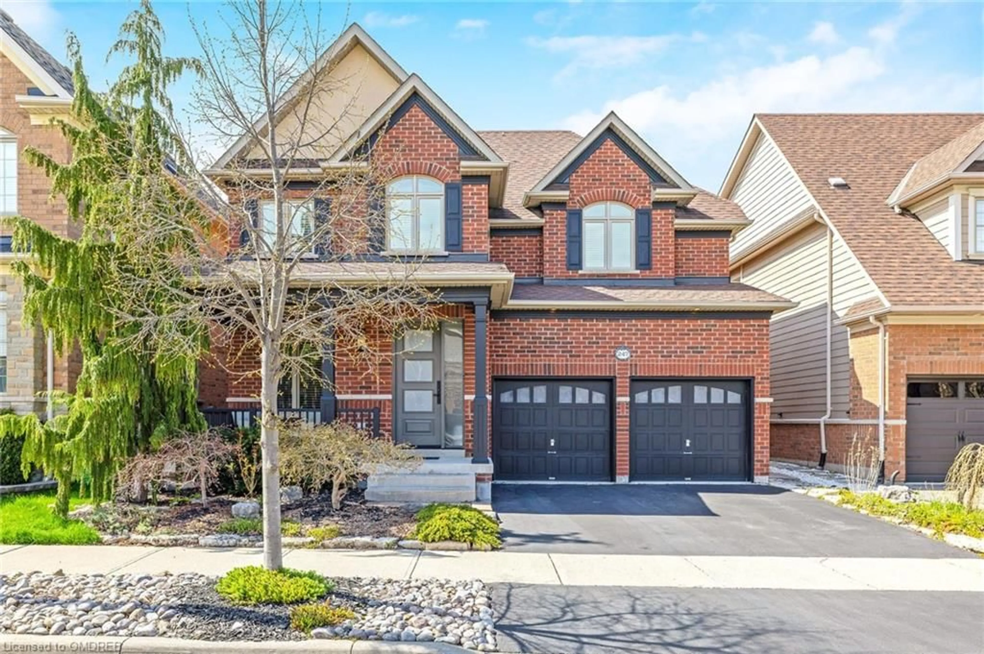 Home with brick exterior material for 247 Huntingford Gate, Milton Ontario L9T 0S4