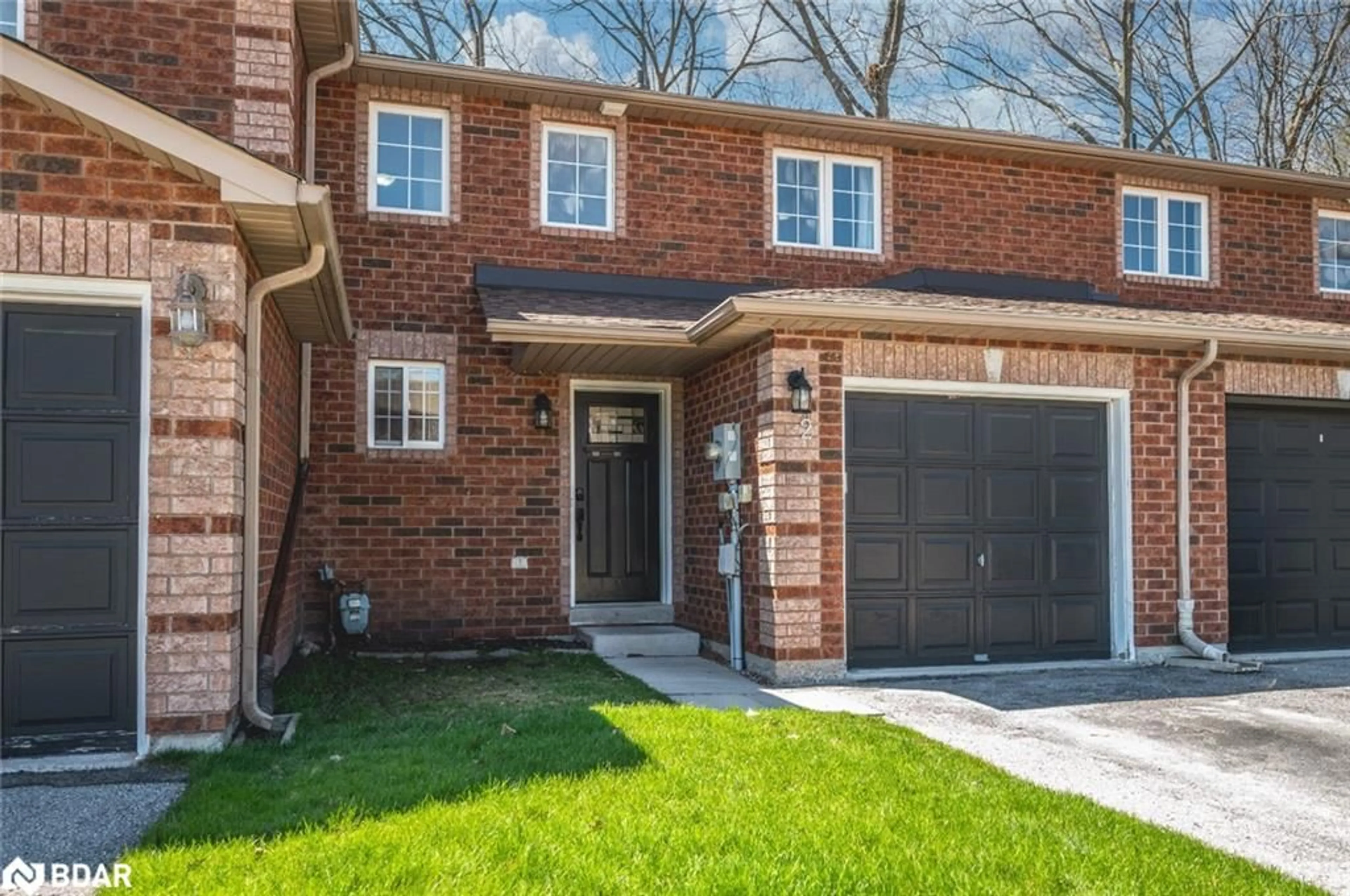 Home with brick exterior material for 38 Kenwell Cres #2, Barrie Ontario L4N 0Z6