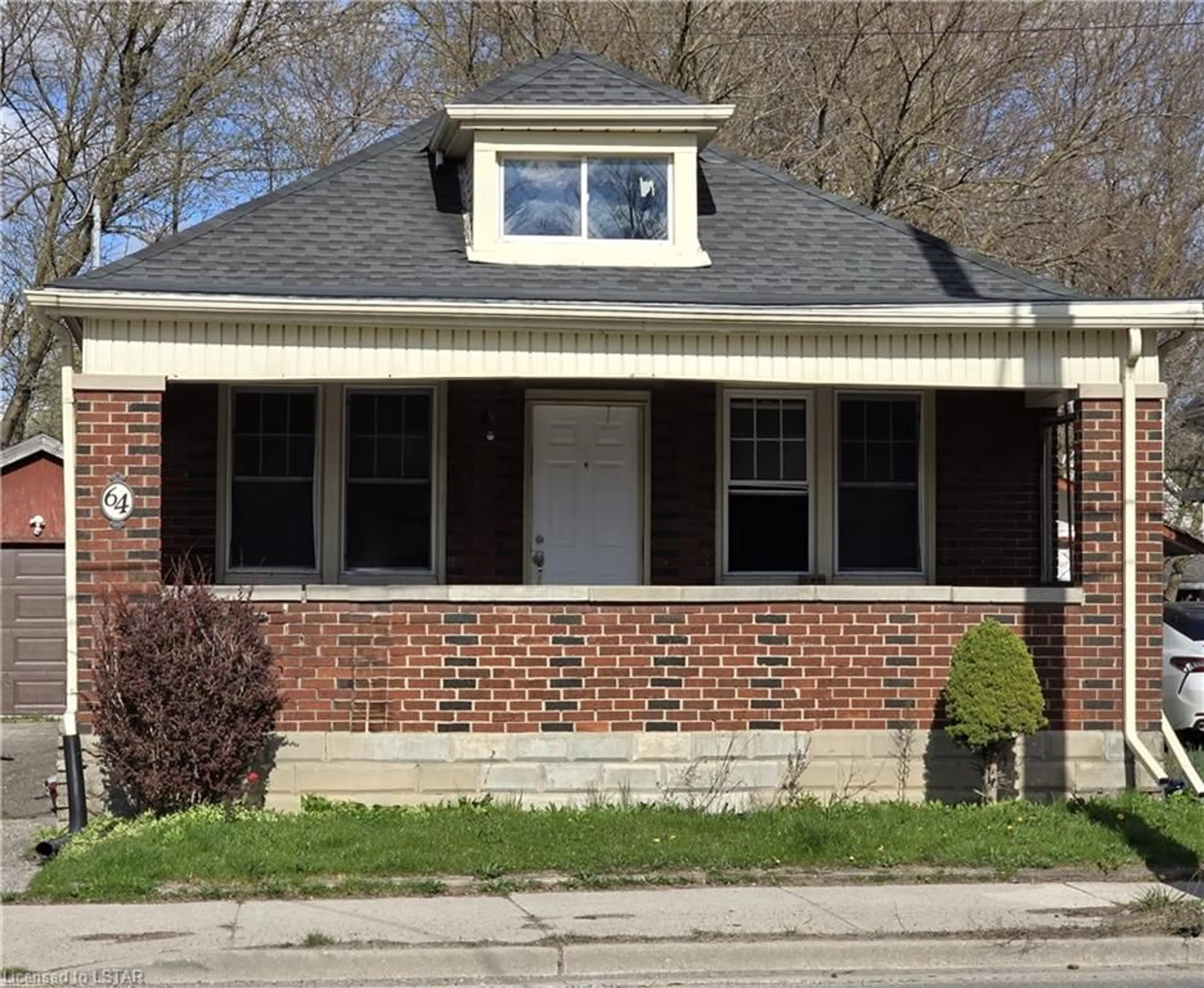 Home with brick exterior material for 64 Adelaide St, London Ontario N5Z 3K4
