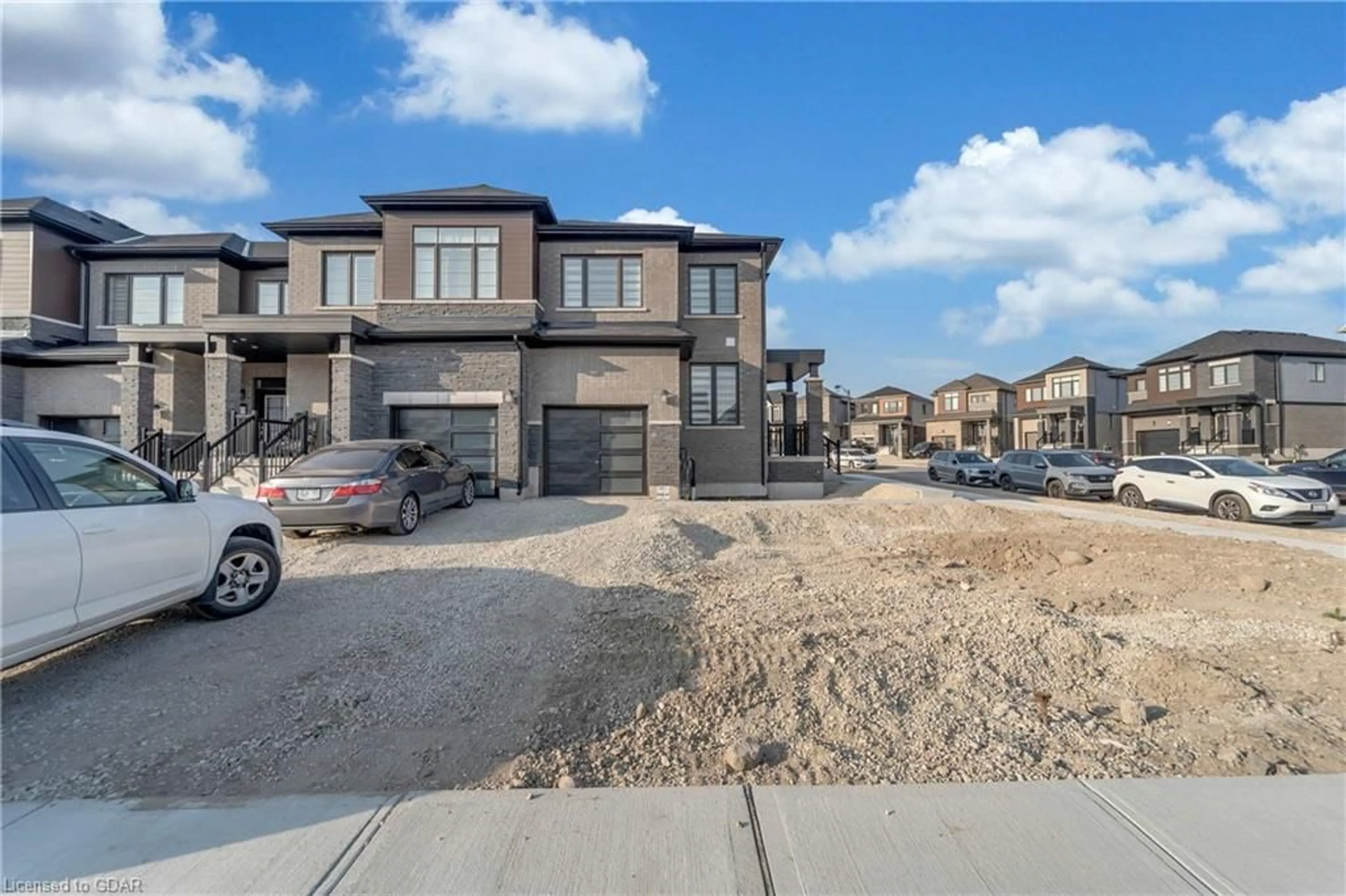 A pic from exterior of the house or condo for 127 Blacksmith Dr, Breslau Ontario N0B 1M0