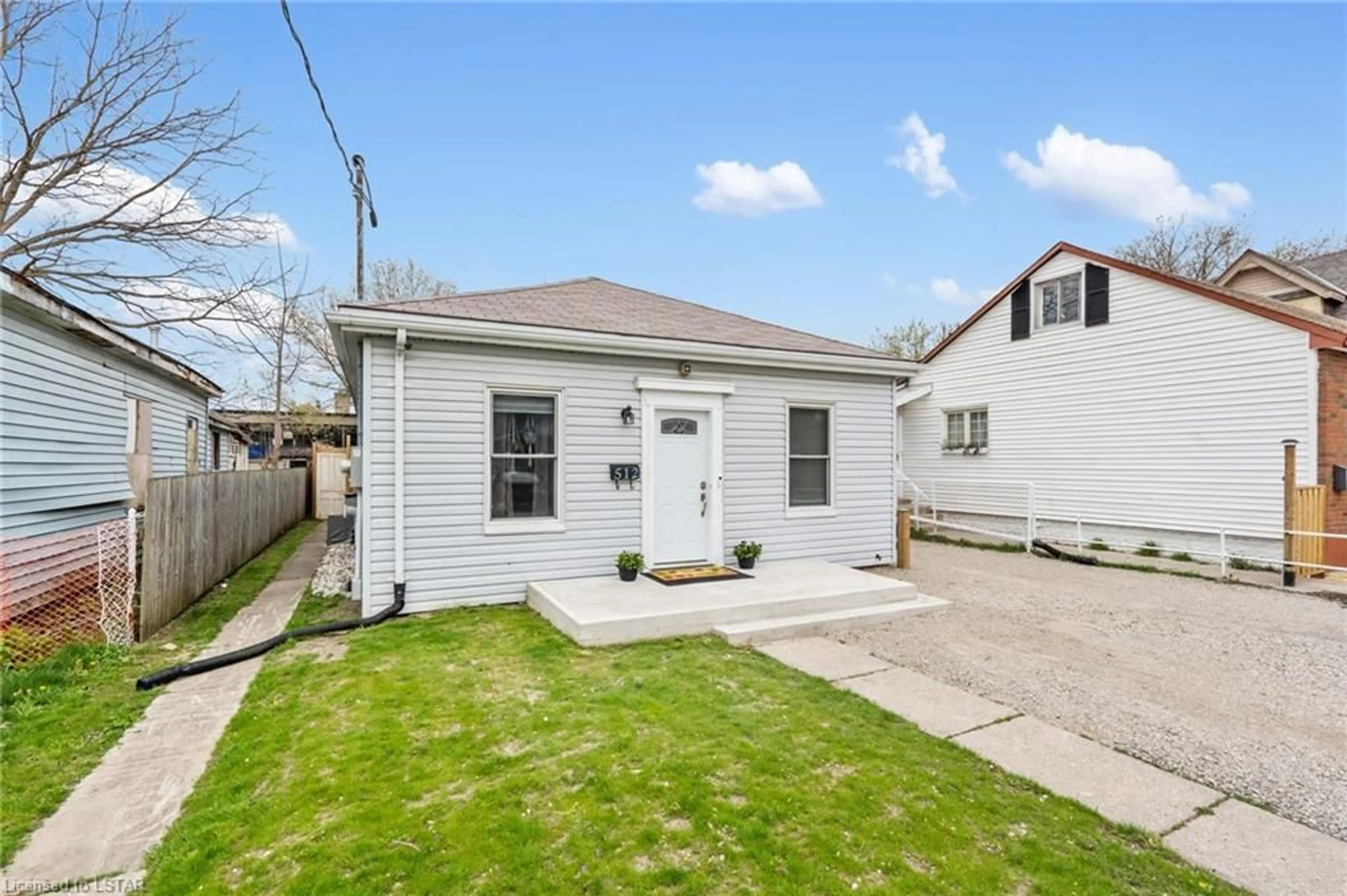 Frontside or backside of a home for 512 Simcoe St, London Ontario N6B 1K4