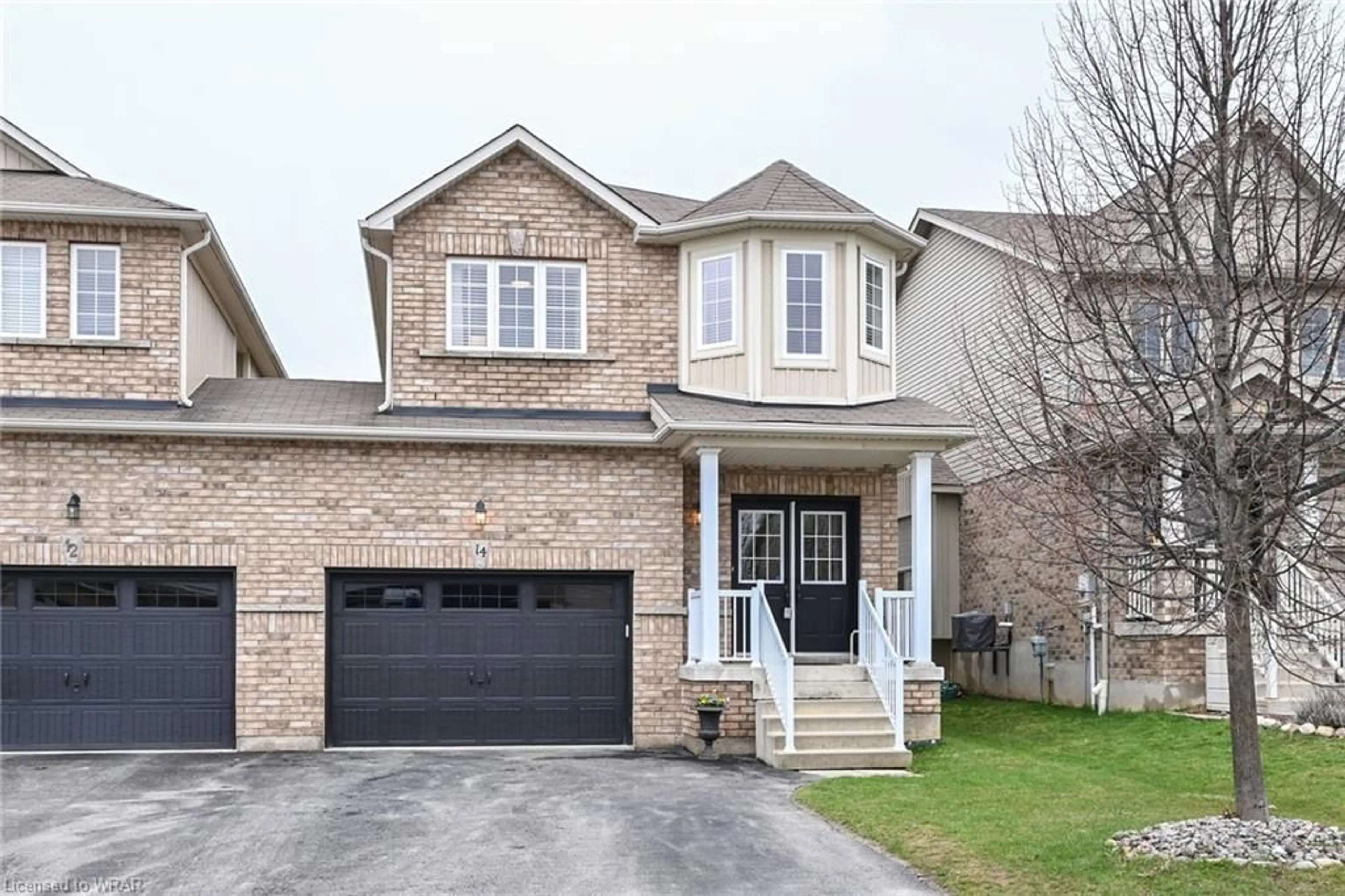 Frontside or backside of a home for 14 James Arnott Cres, Orangeville Ontario L9W 0B5