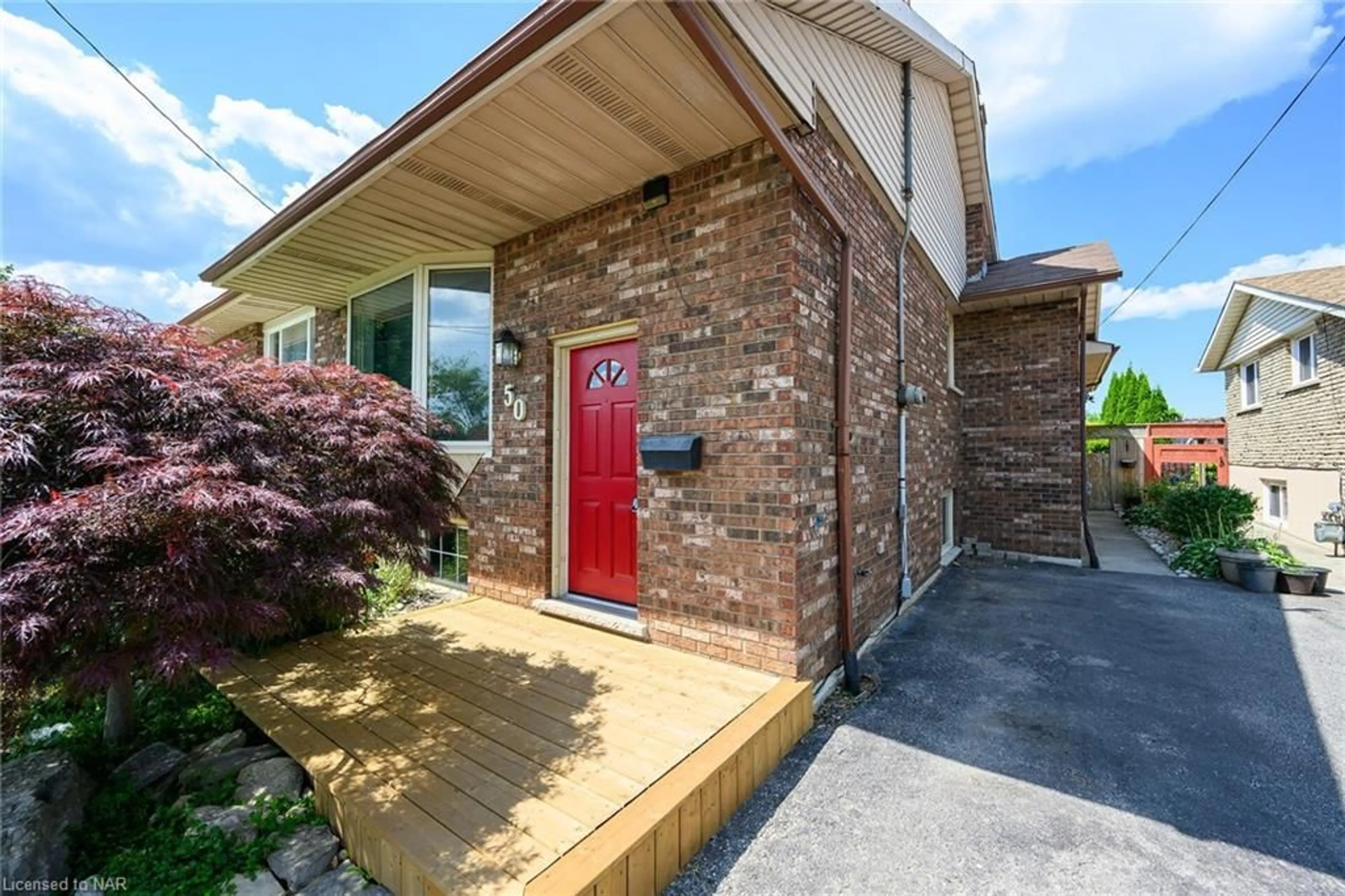 Home with brick exterior material for 50 Adis Ave, Hamilton Ontario L9C 6V3