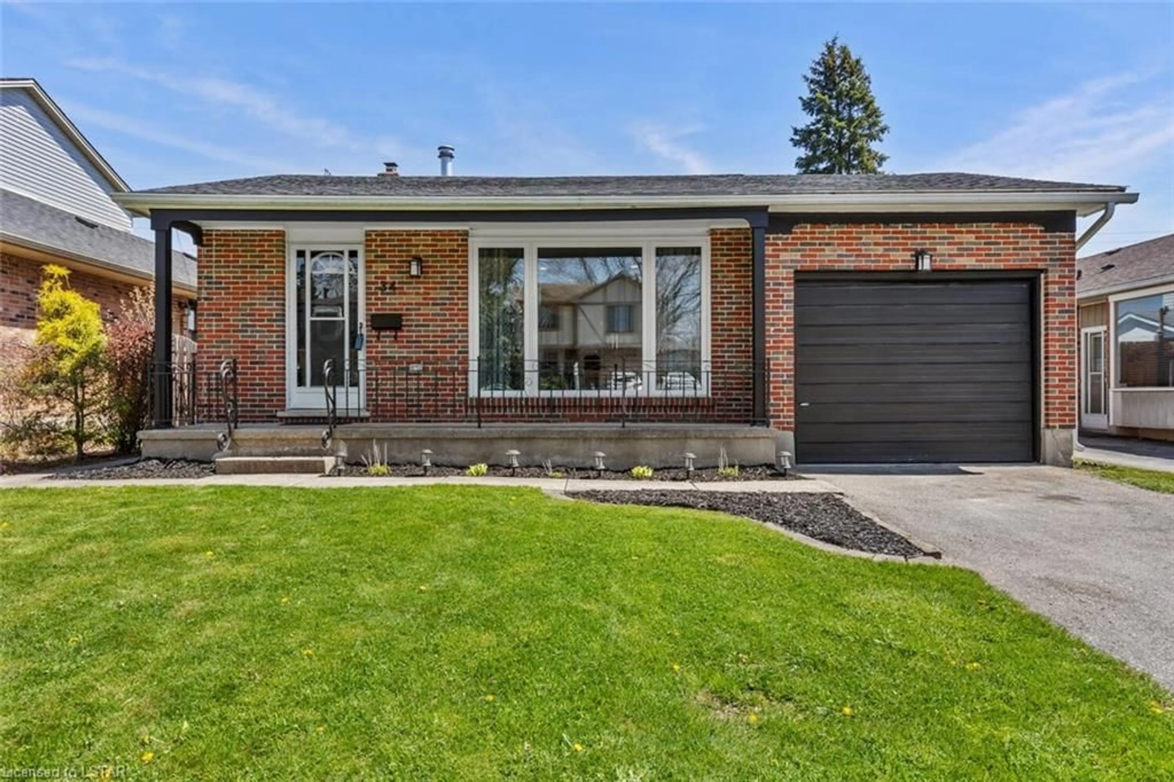 Home with brick exterior material for 34 Lochern Rd, London Ontario N5Z 4L6