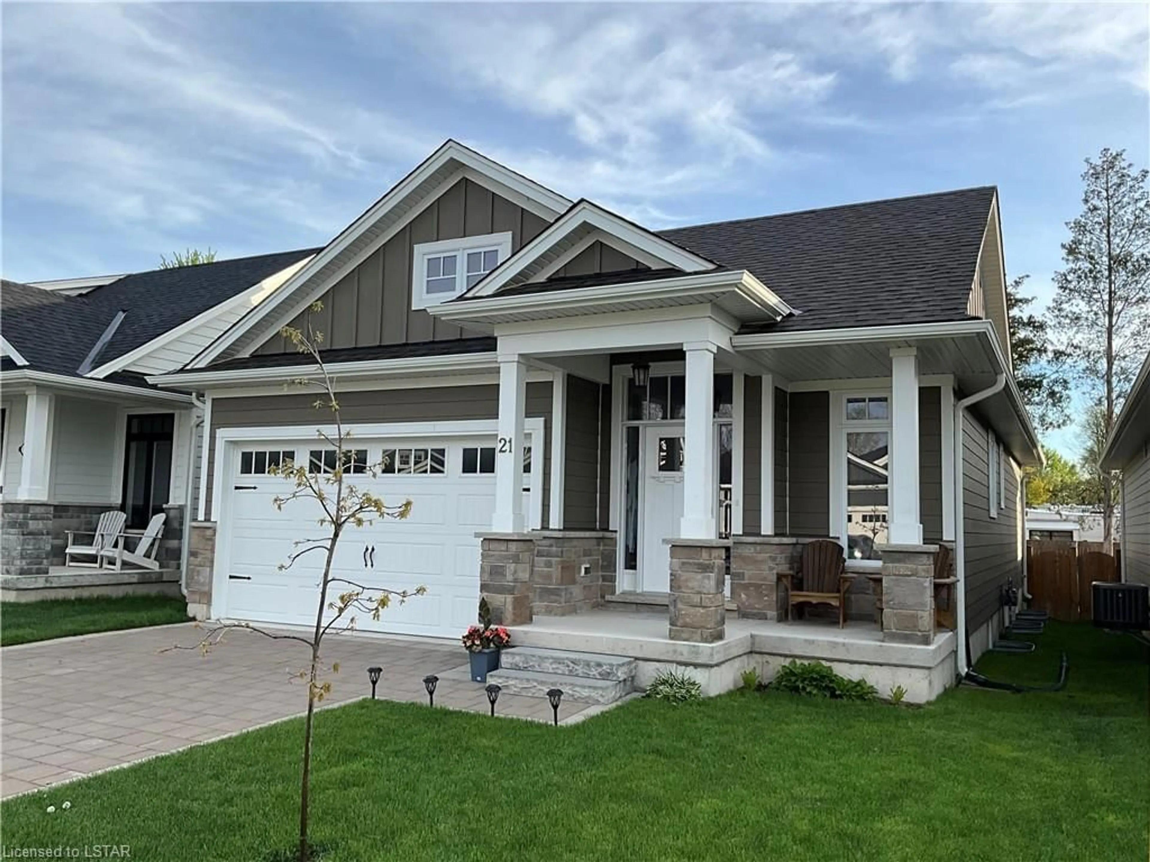 Frontside or backside of a home for 21 Creek Side Pl, Grand Bend Ontario N0M 1T0