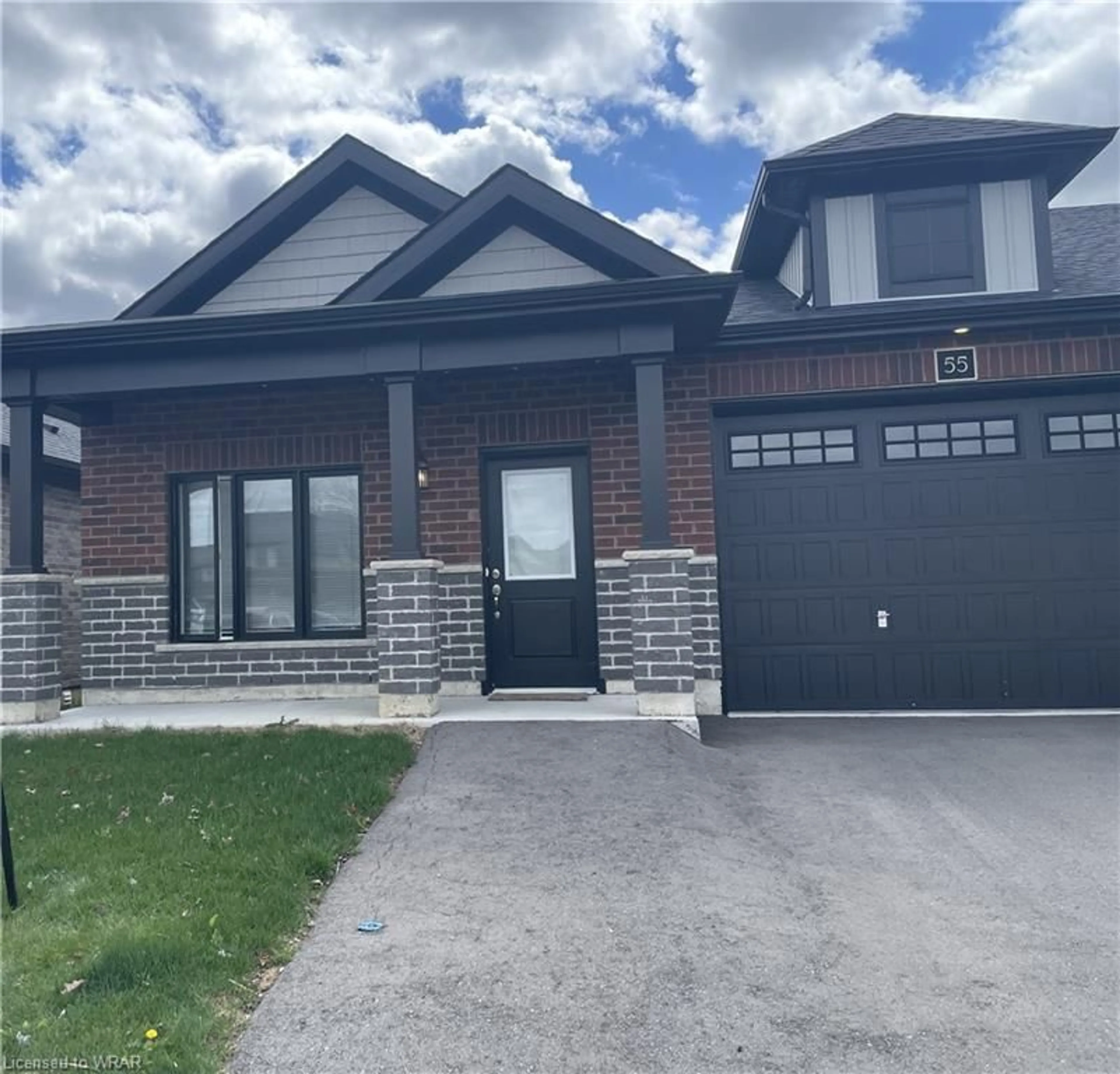 Home with brick exterior material for 55 Waterthrush Lane, Simcoe Ontario N3E 0E9