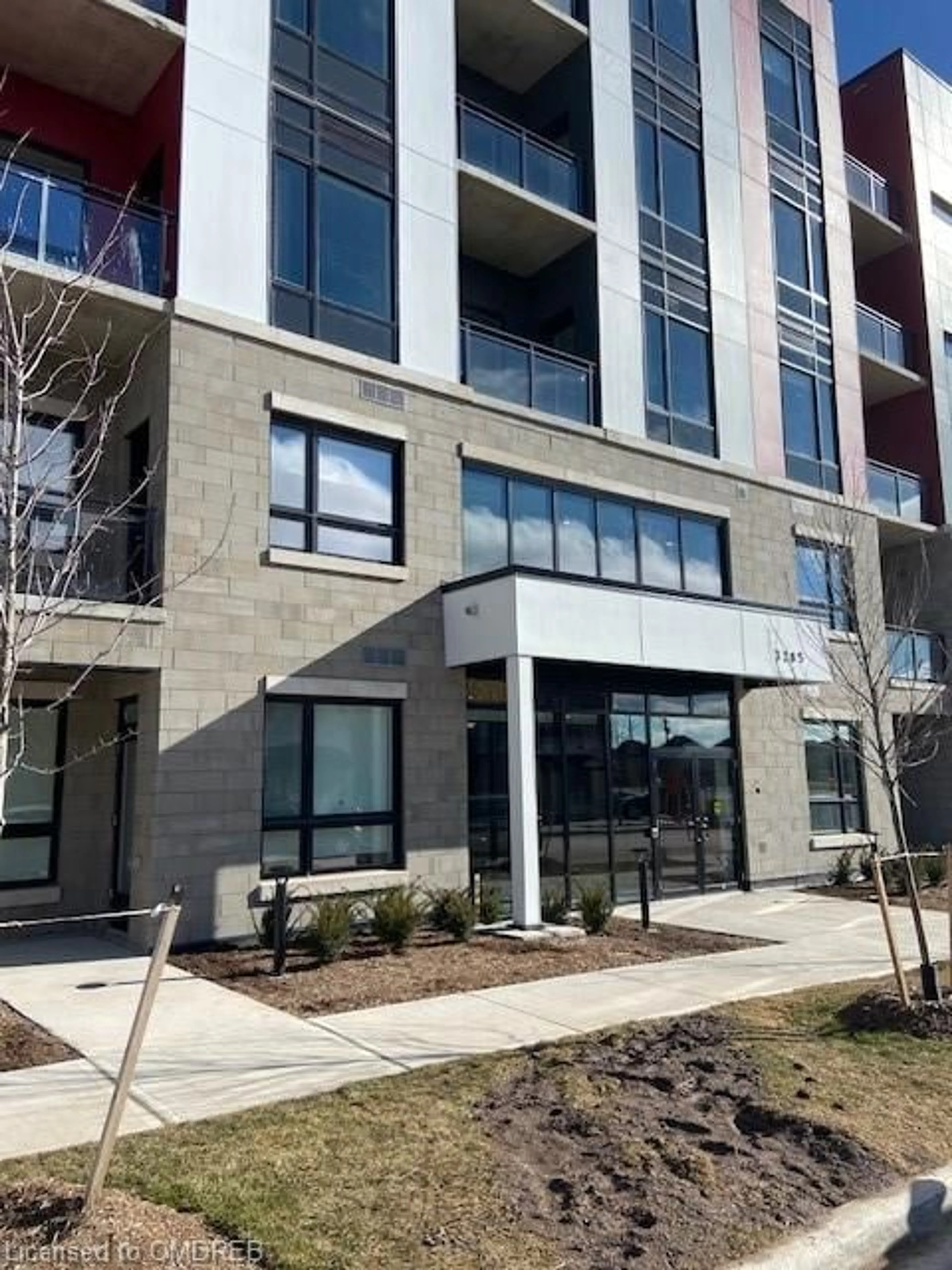 A pic from exterior of the house or condo for 3285 Carding Mill Trail #407, Oakville Ontario L6M 1S1
