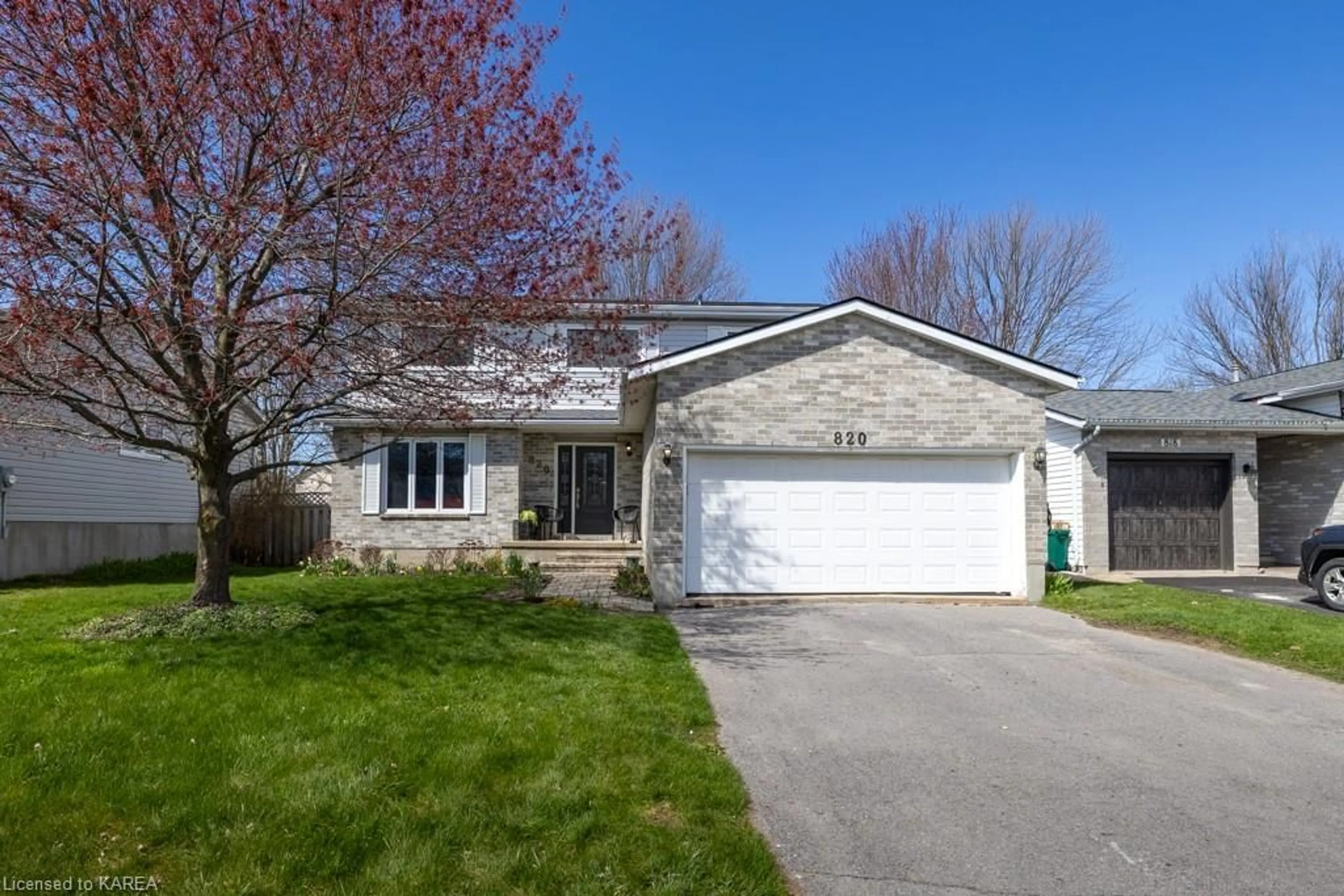 Frontside or backside of a home for 820 Cataraqui Woods Dr, Kingston Ontario K7P 2P9