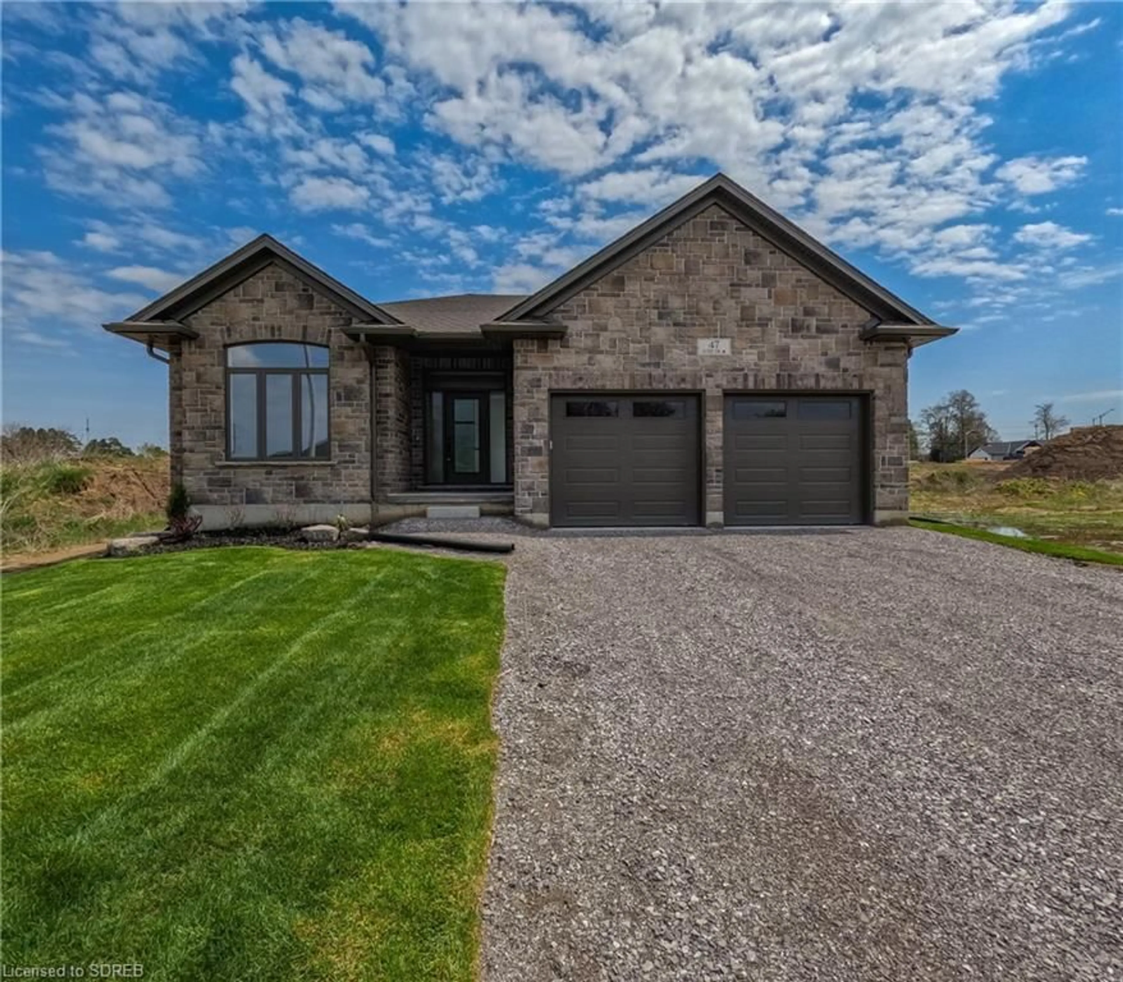 Home with brick exterior material for 47 Judd Dr, Simcoe Ontario N3Y 4Y8