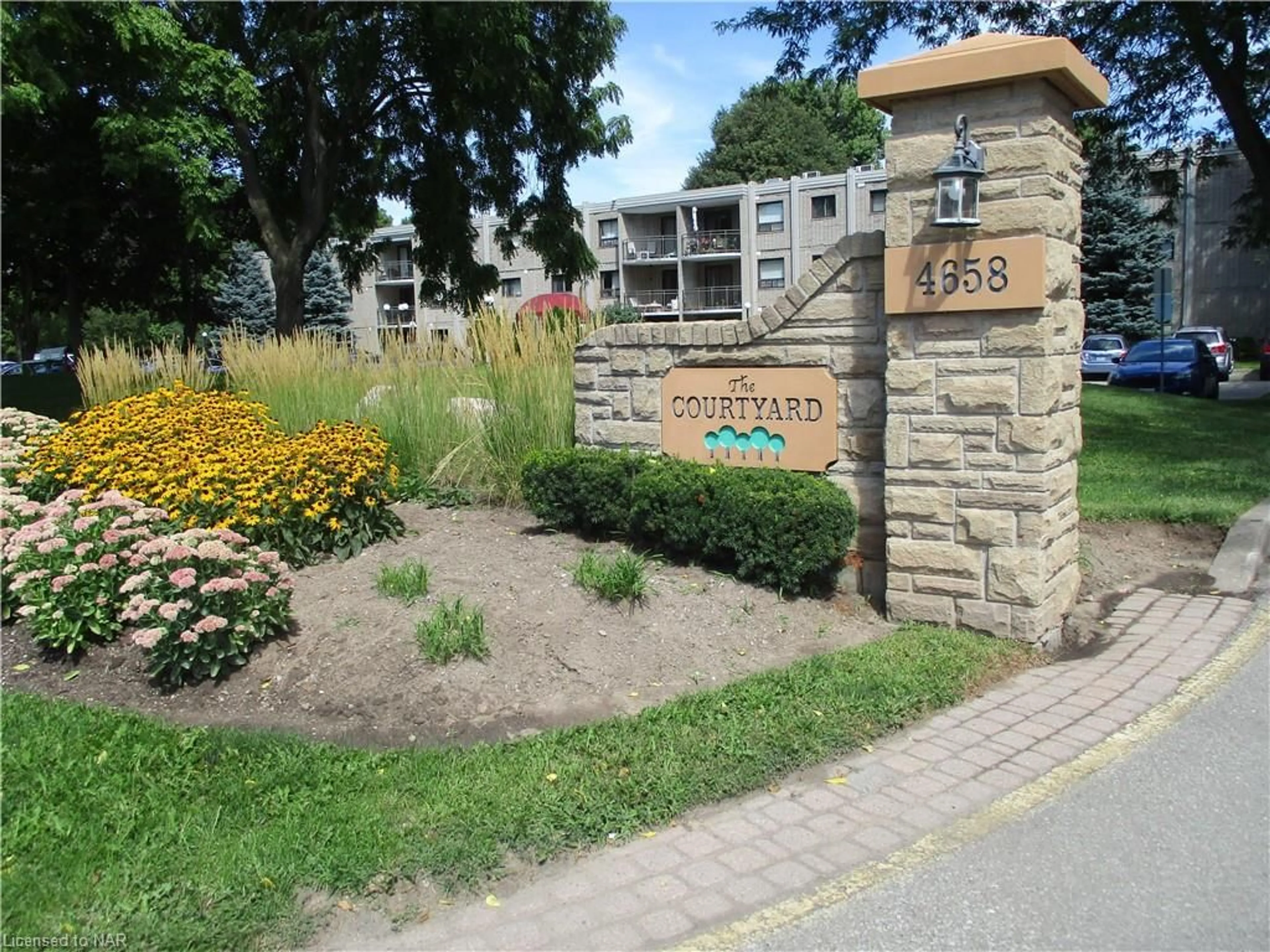 A pic from exterior of the house or condo for 4658 Drummond Rd #314, Niagara Falls Ontario L2E 7E1