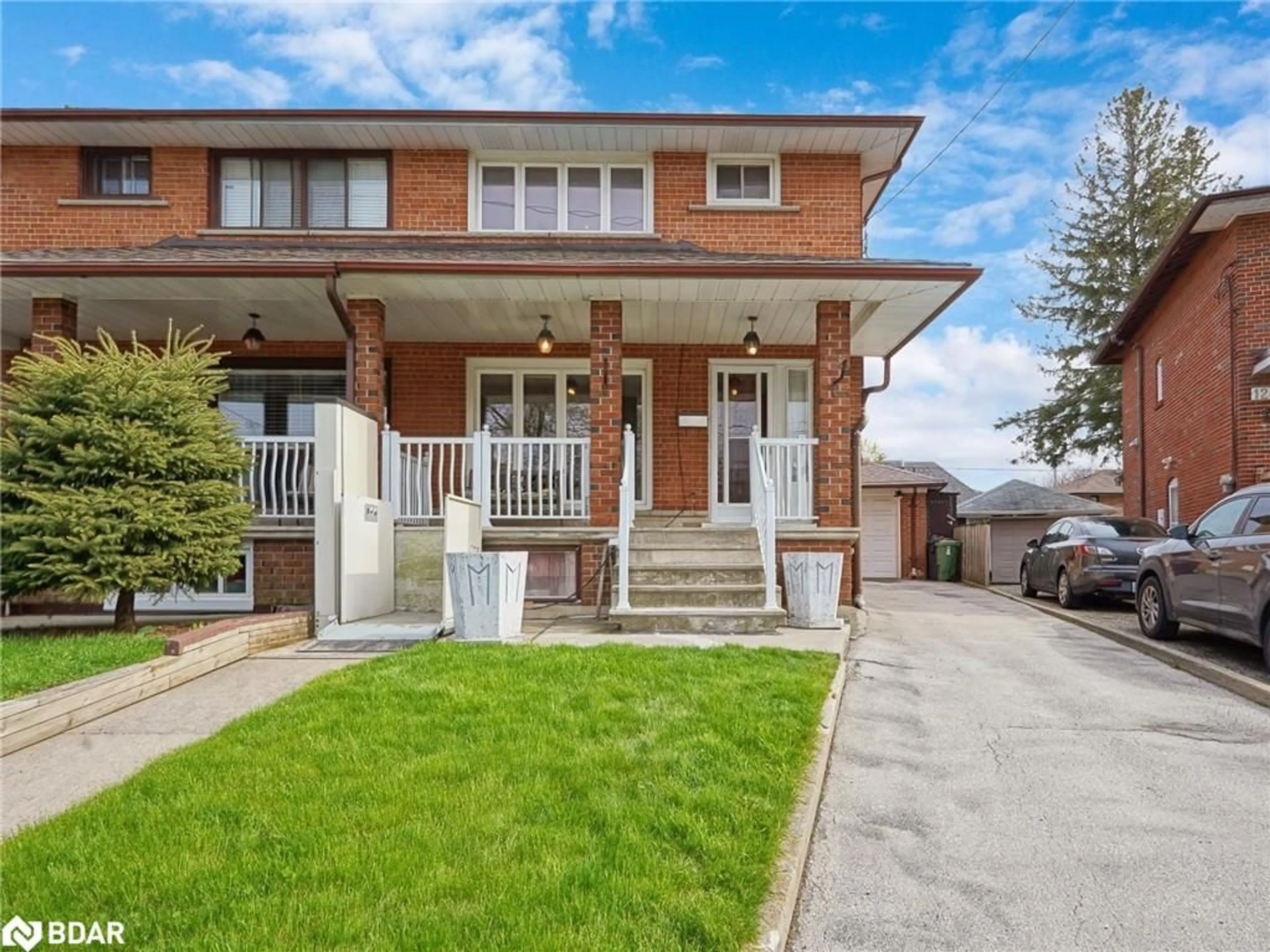 Frontside or backside of a home for 122 Brookhaven Dr, Toronto Ontario M6M 4P2