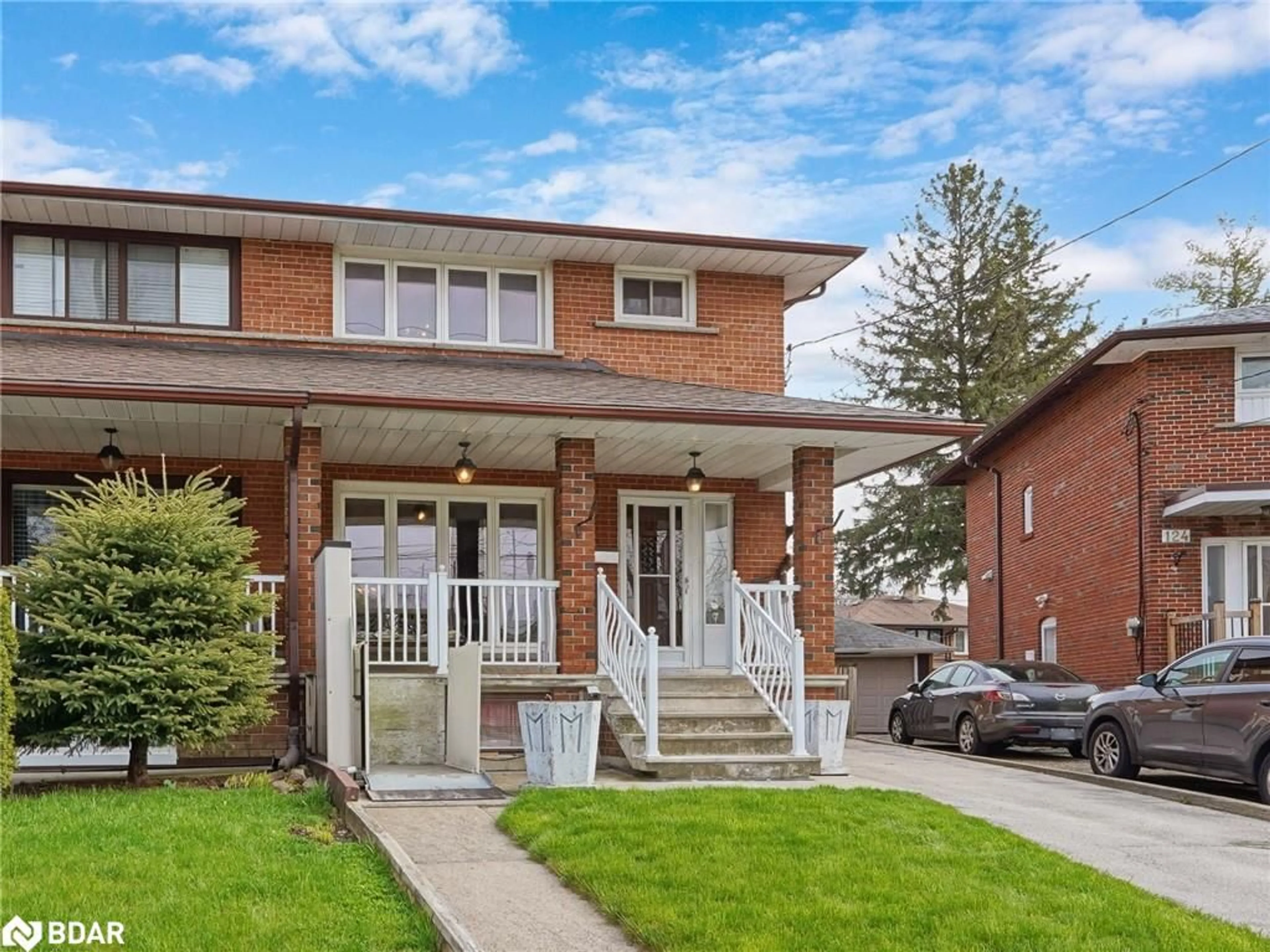 Home with brick exterior material for 122 Brookhaven Dr, Toronto Ontario M6M 4P2