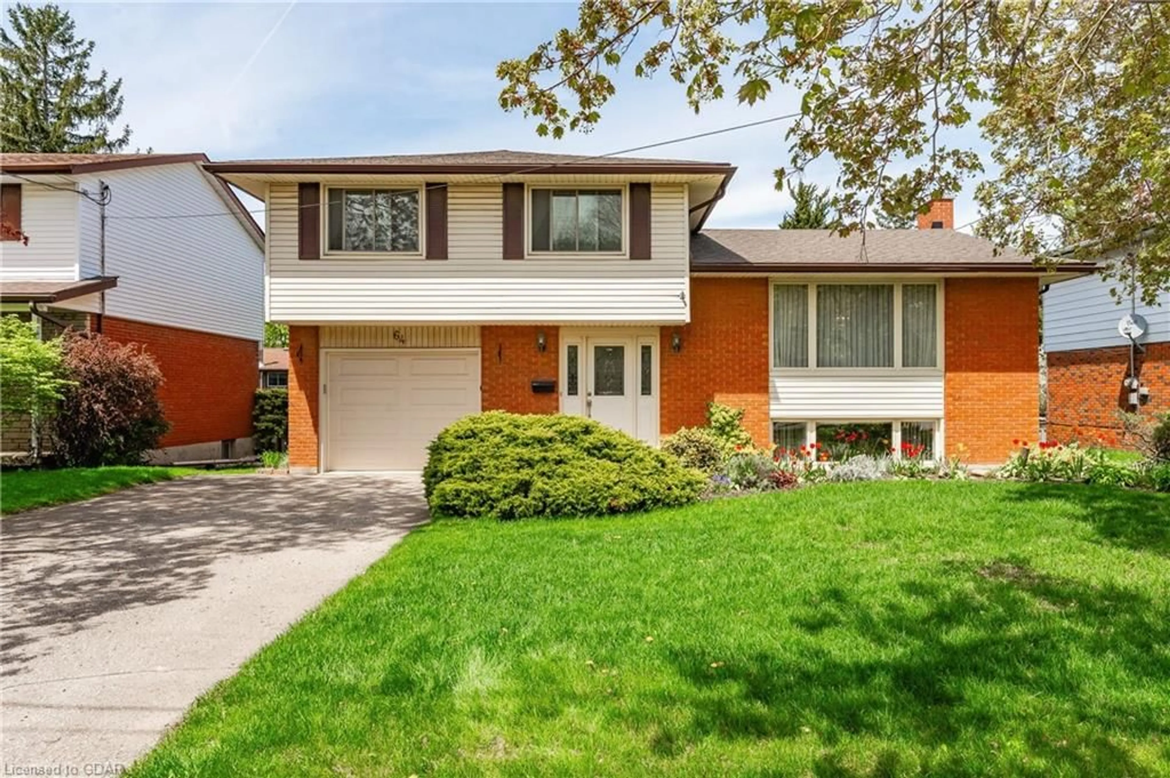 Home with brick exterior material for 64 Brentwood Dr, Guelph Ontario N1H 5M7