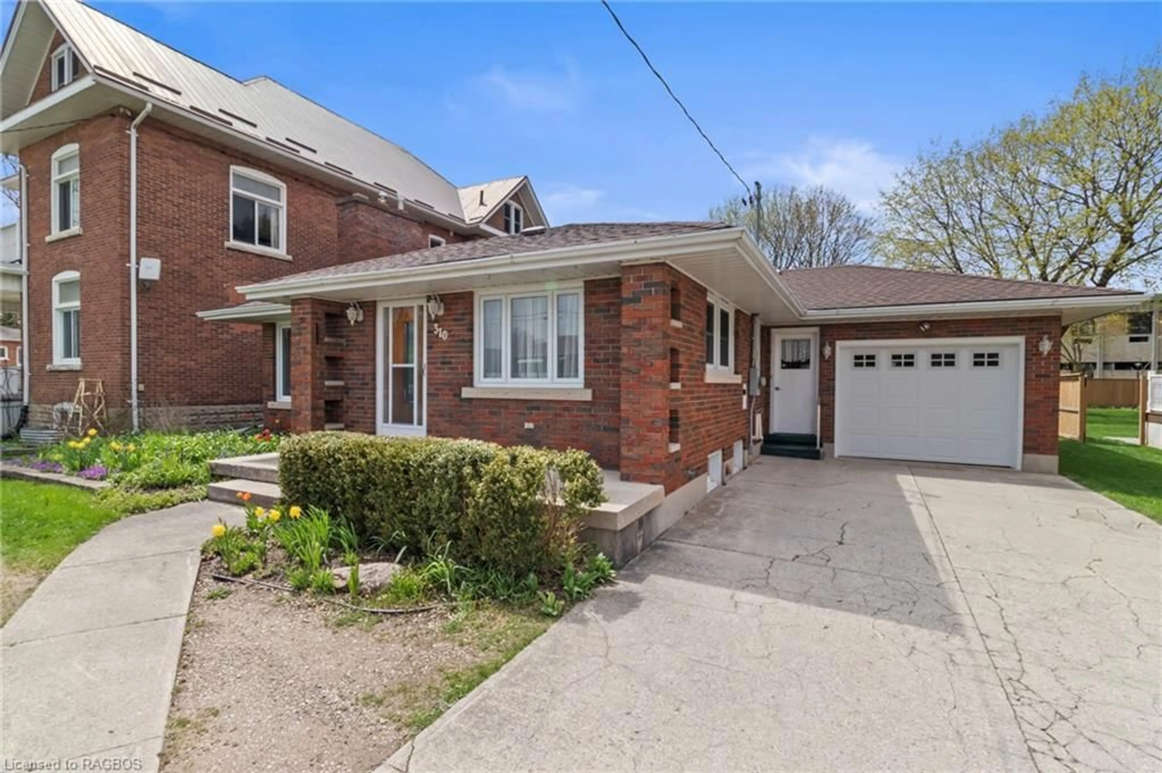 Home with brick exterior material for 310 7th Ave, Hanover Ontario N4N 2H7