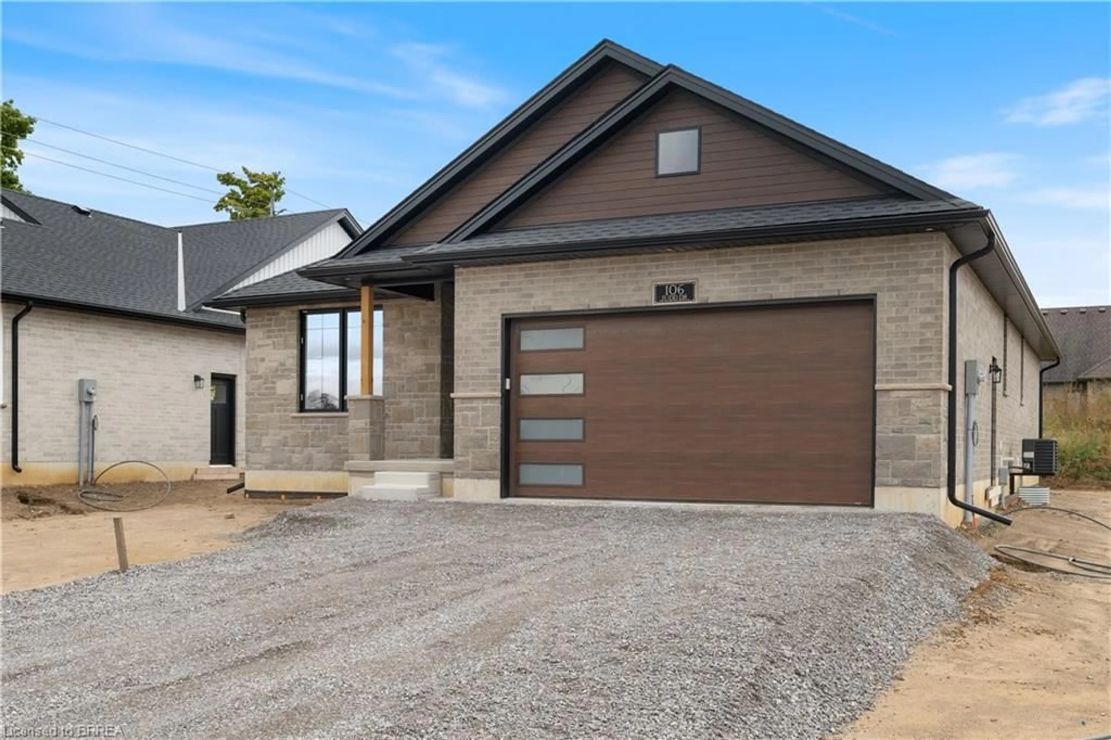 Home with brick exterior material for 107 Judd Dr, Simcoe Ontario N3Y 4Y8