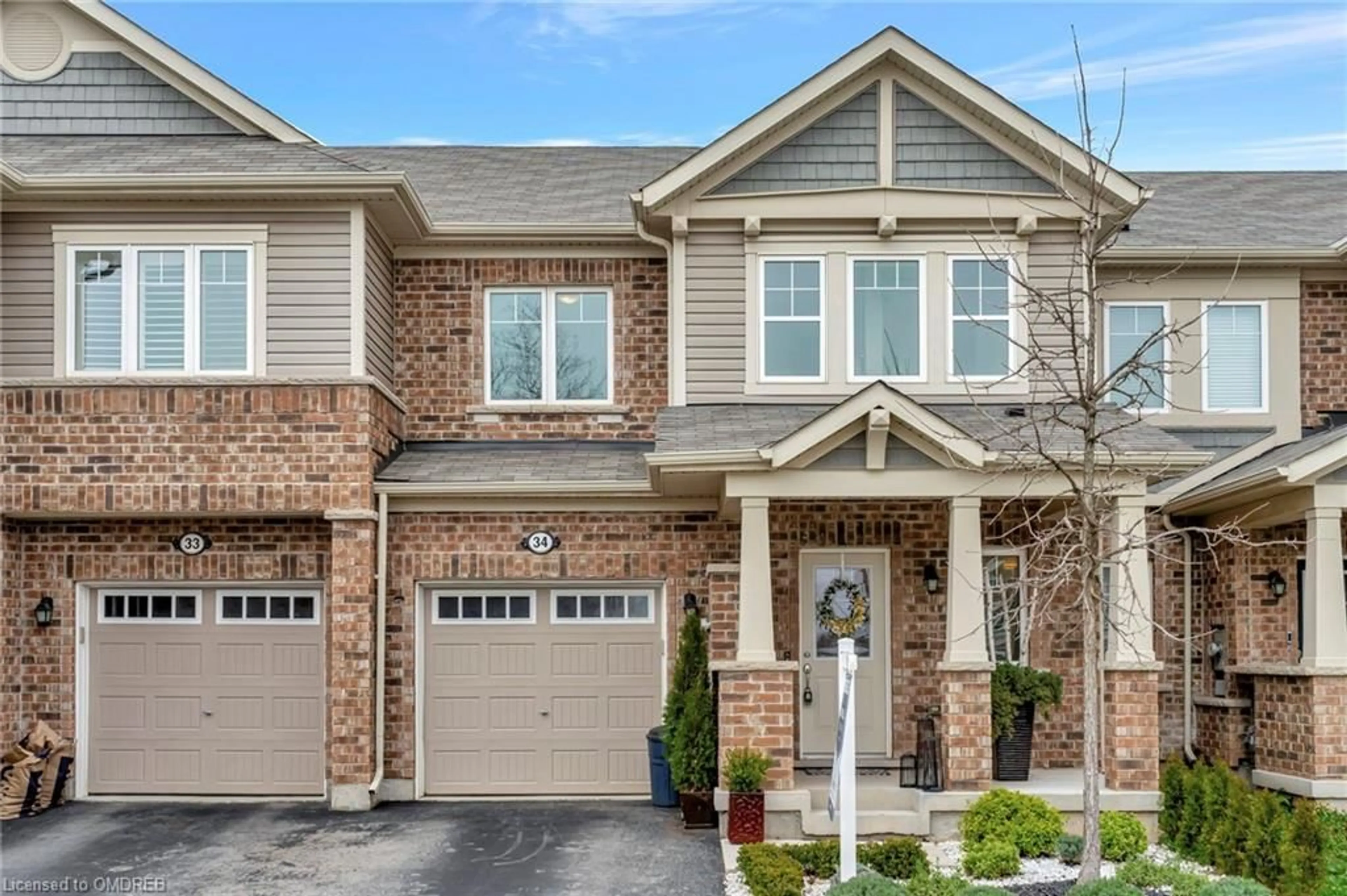 Home with brick exterior material for 22 Spring Creek Dr #34, Waterdown Ontario 18B 1V7