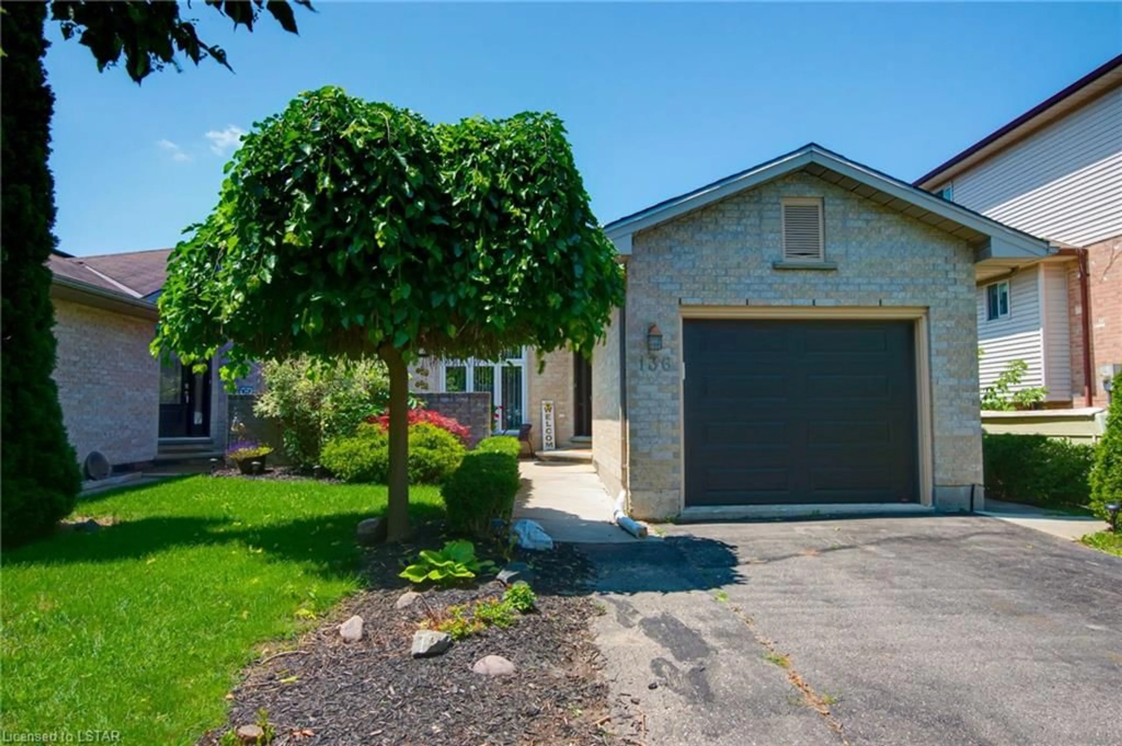 Frontside or backside of a home for 136 Cobblestone St, London Ontario N5Y 5N2