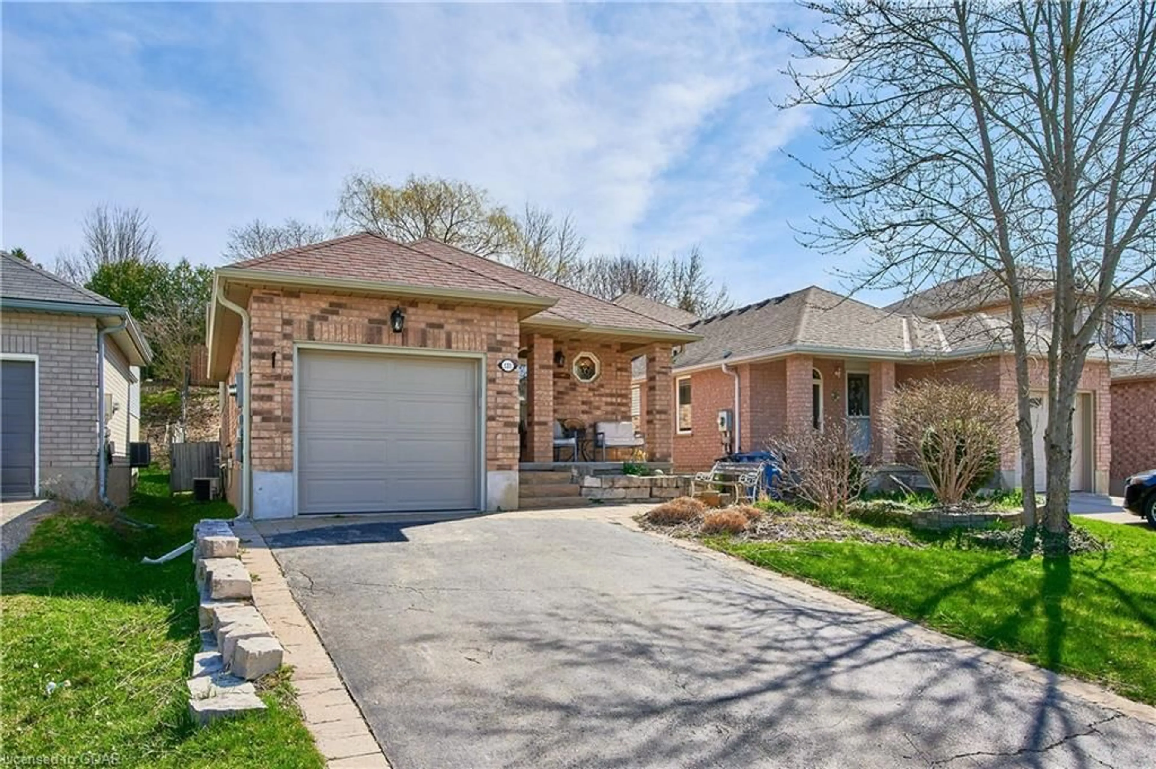 Home with brick exterior material for 131 Ptarmigan Dr, Guelph Ontario N1C 1E9