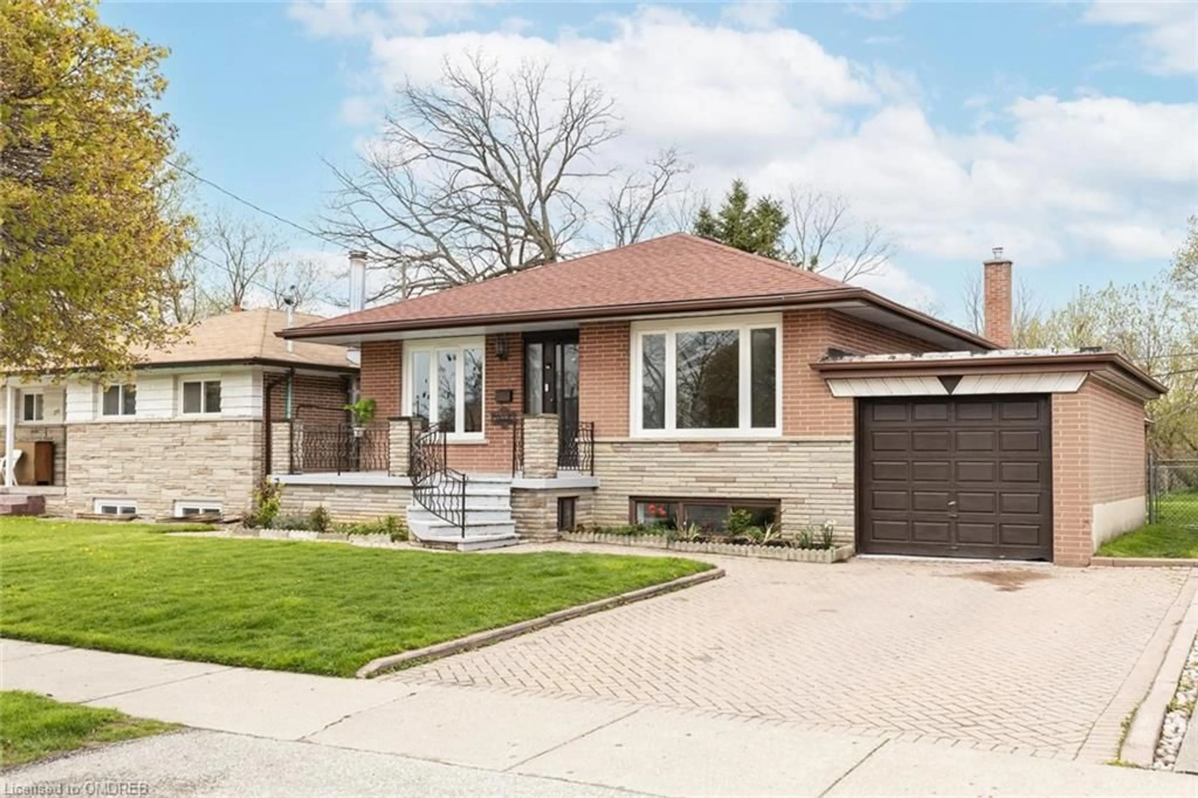 Home with brick exterior material for 253 Thistledown Blvd, Toronto Ontario M9V 1K6