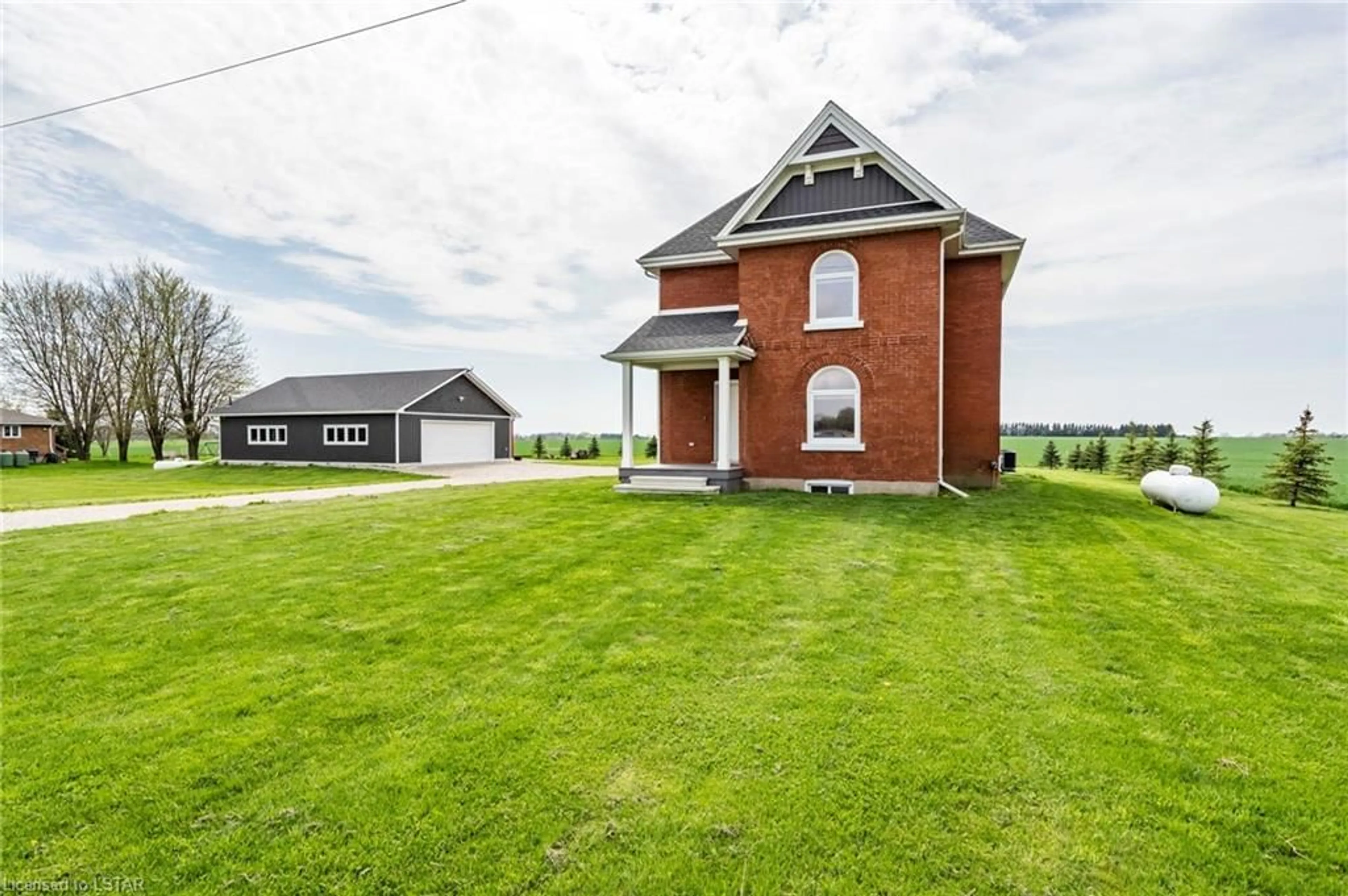 Home with brick exterior material for 21575 Heritage Road Rd, Thorndale Ontario N0M 2P0