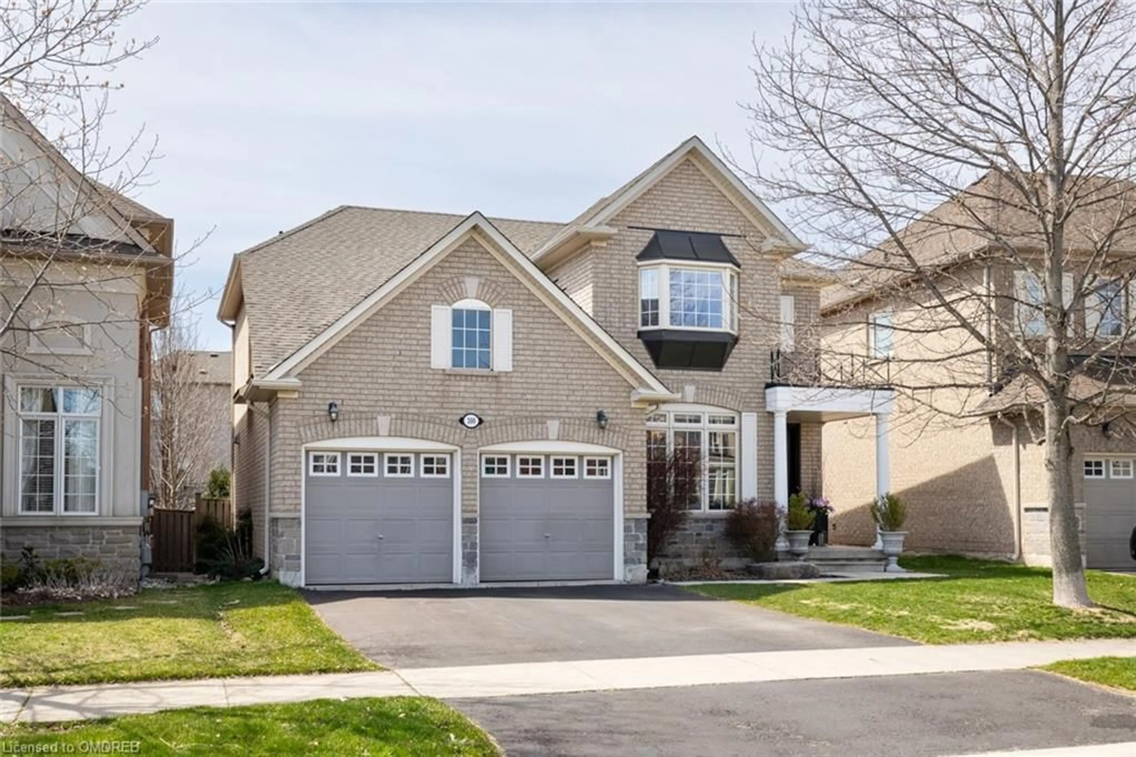 Frontside or backside of a home for 300 Fritillary St, Oakville Ontario L6L 6W7