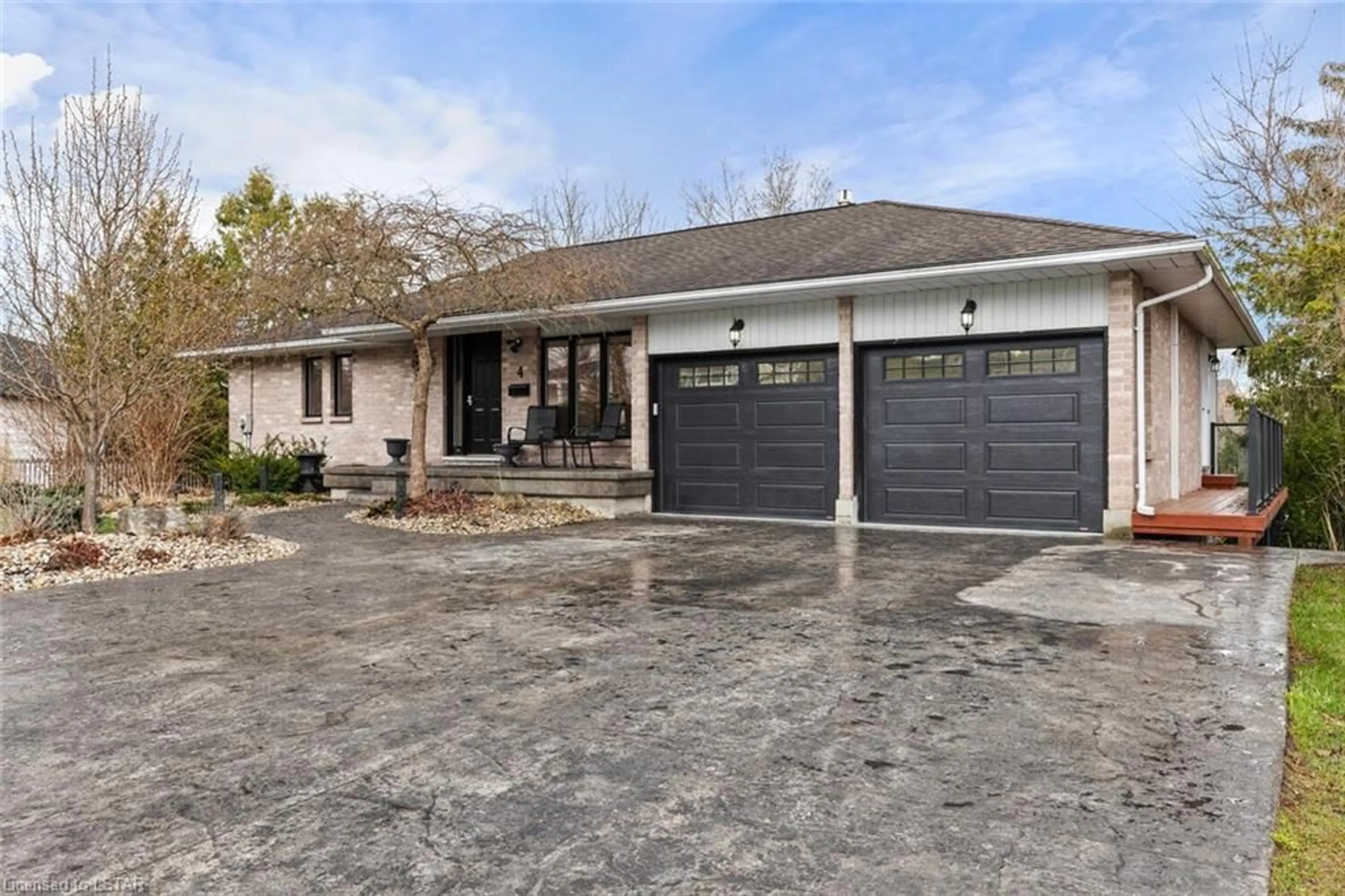 Frontside or backside of a home for 4 Woodland Rd, St. Thomas Ontario N5P 1P2