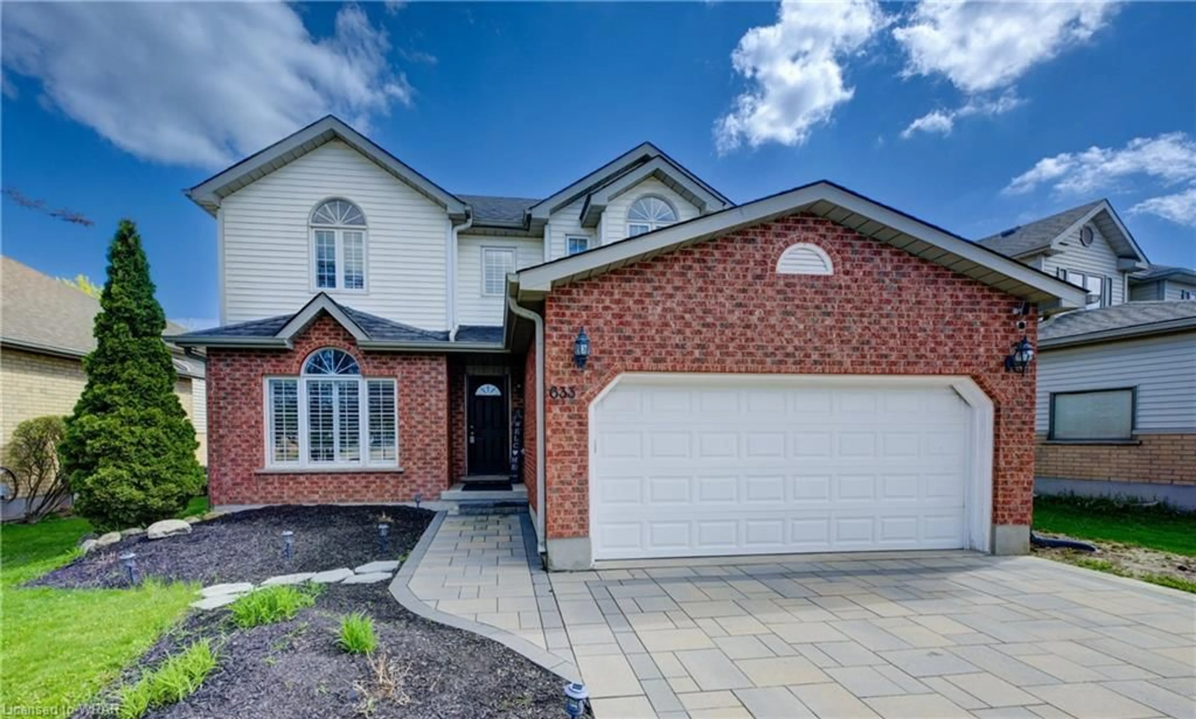 Home with brick exterior material for 633 Cardiff St, Waterloo Ontario N2T 2P2