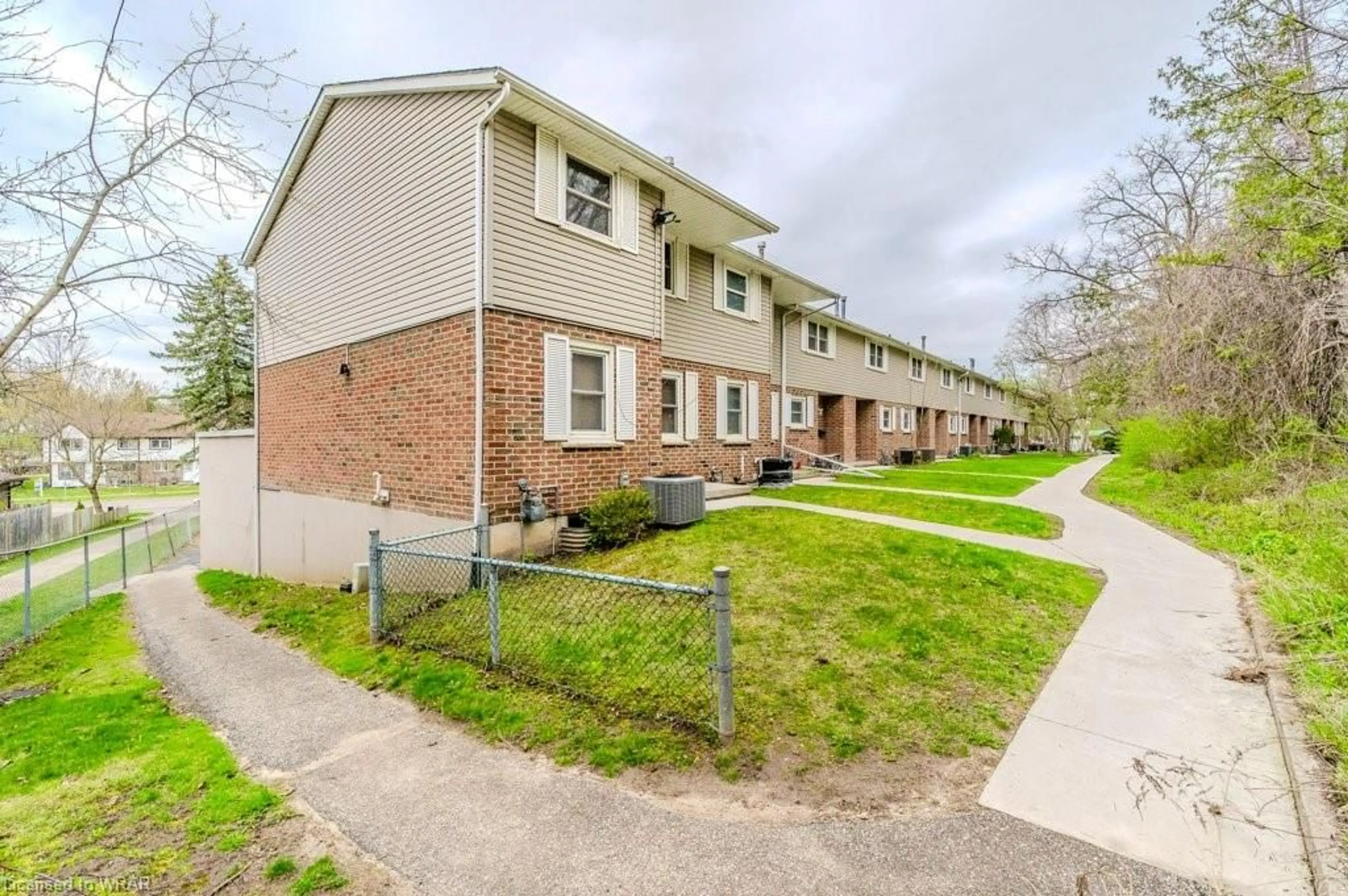 A pic from exterior of the house or condo for 410 Pioneer Dr #5, Kitchener Ontario N2P 1H6