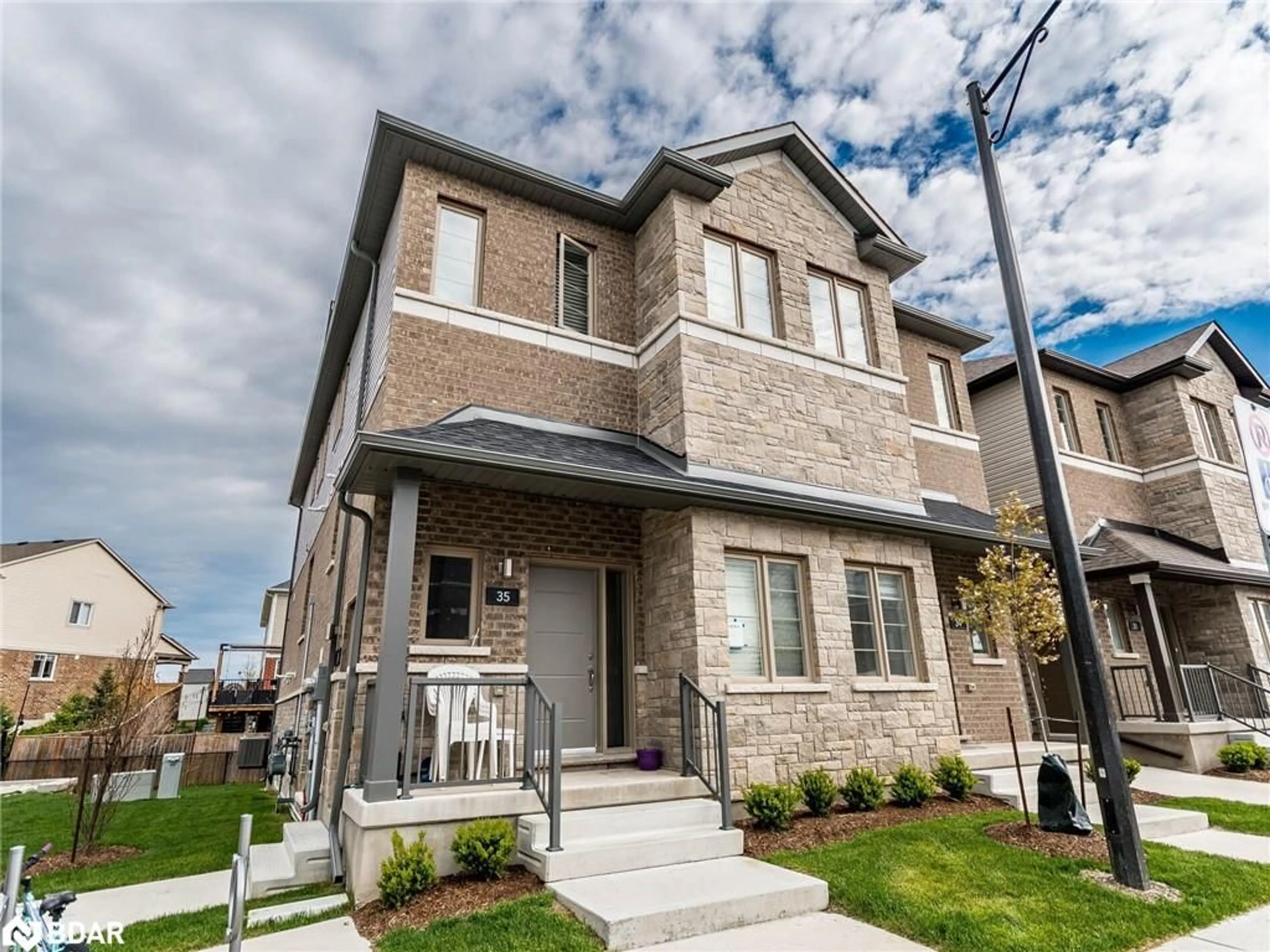 Home with brick exterior material for 205 West Oak Trail #35, Kitchener Ontario N2R 0R9