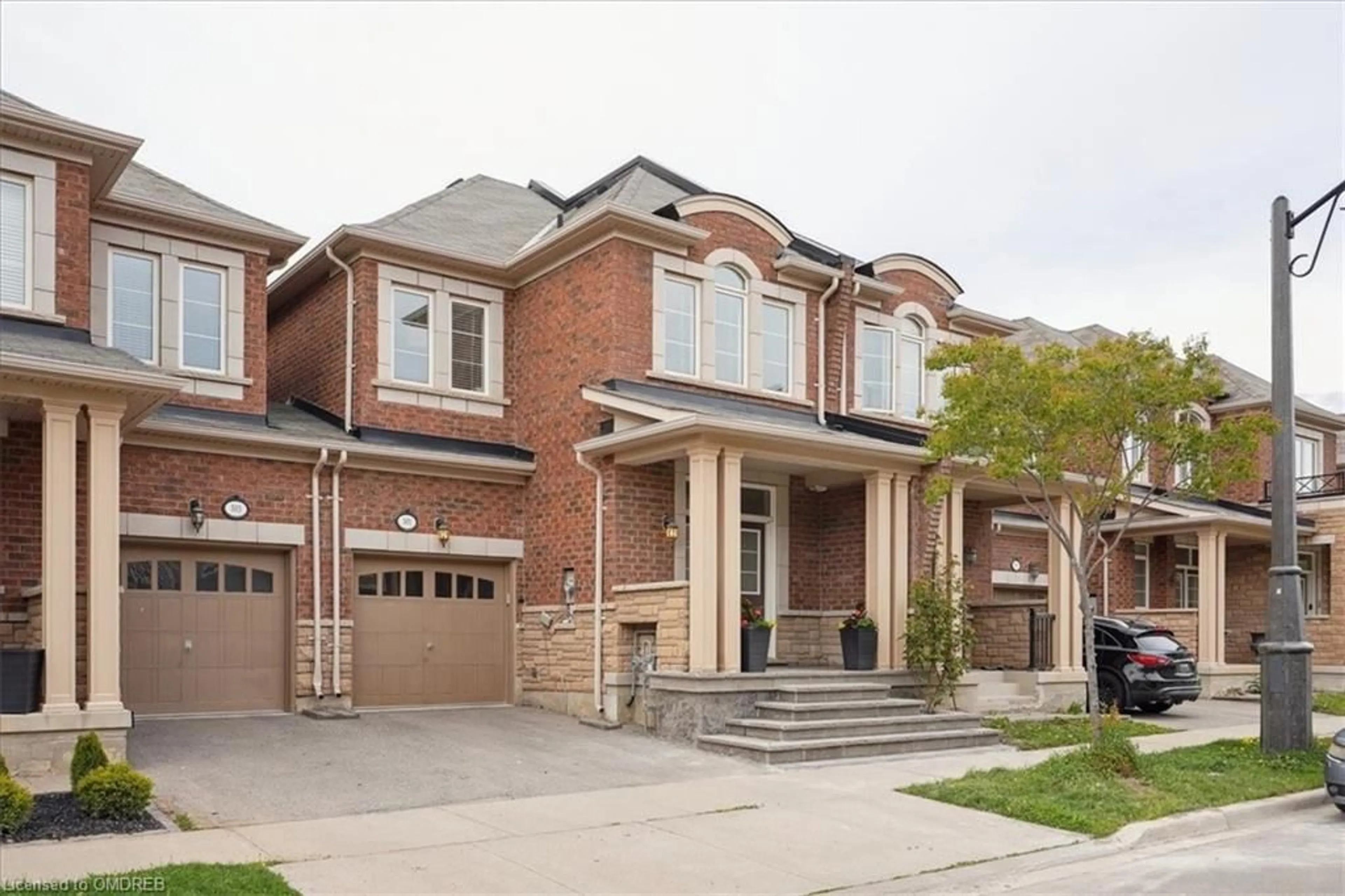 Home with brick exterior material for 301 Sarah Cline Dr, Oakville Ontario L6M 0V7