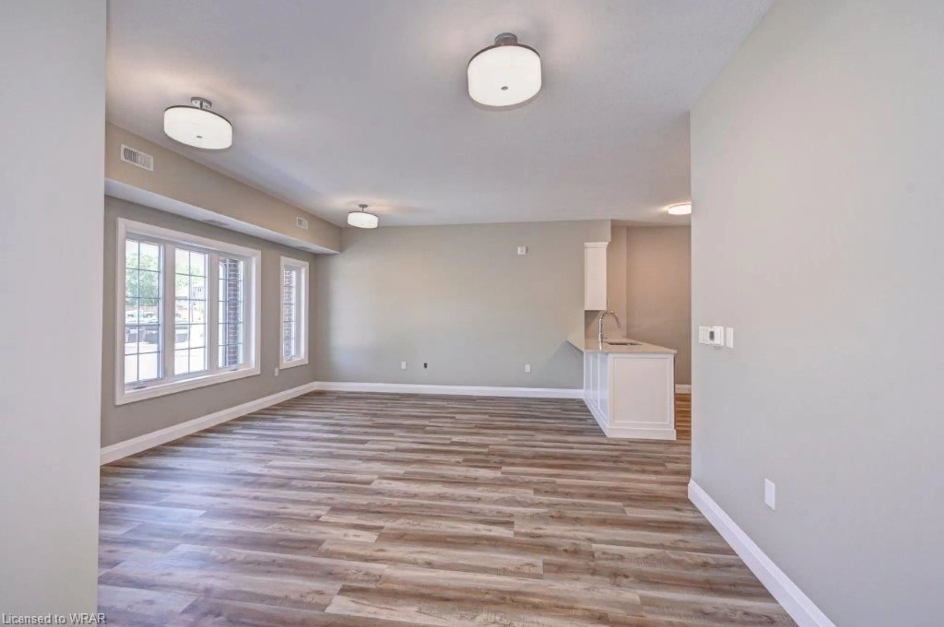 A pic of a room, wood floors for 33 Murray Crt #1, Milverton Ontario N0K 1M0