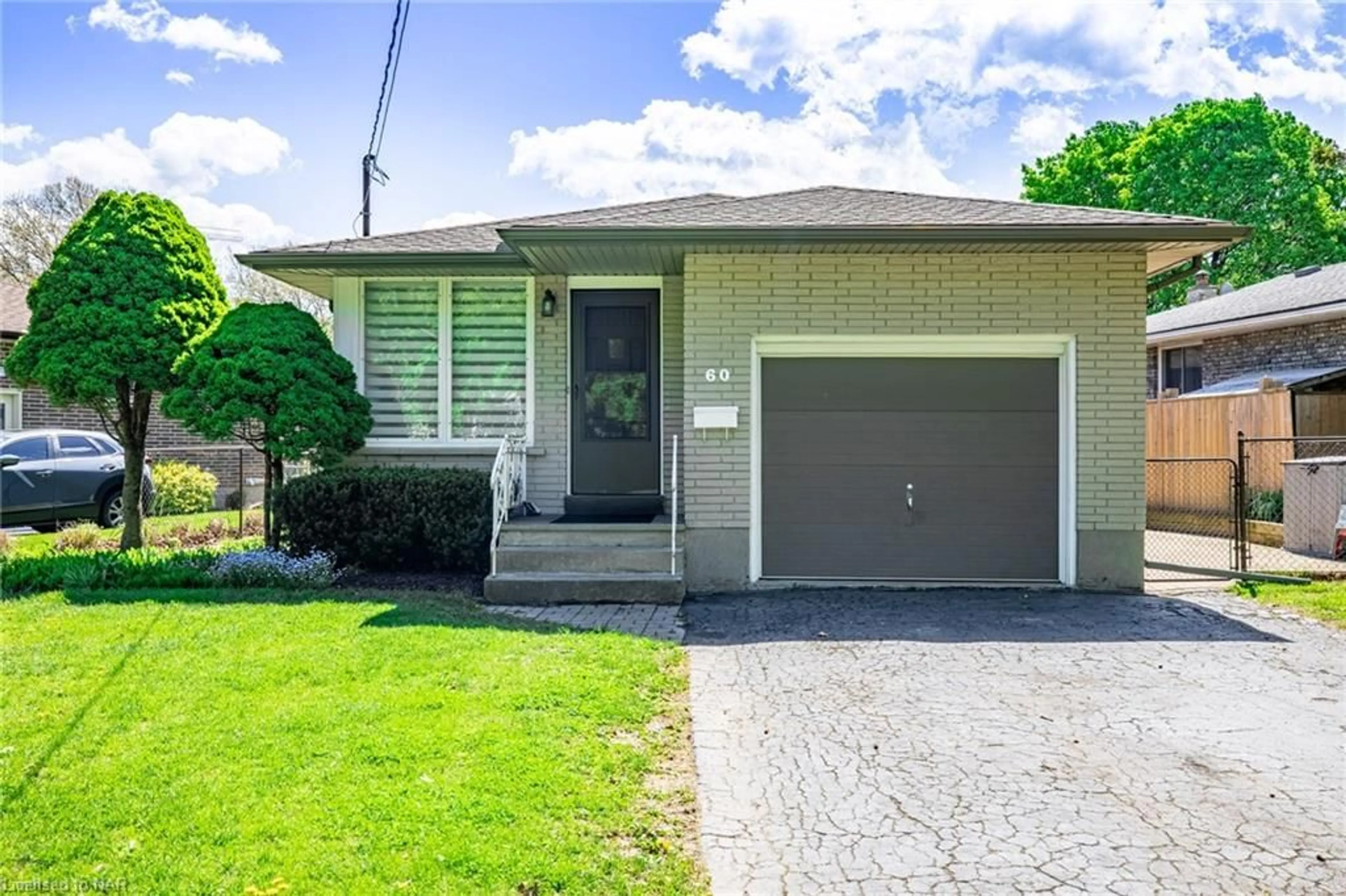 Frontside or backside of a home for 60 Pearce Ave, St. Catharines Ontario L2M 6N4