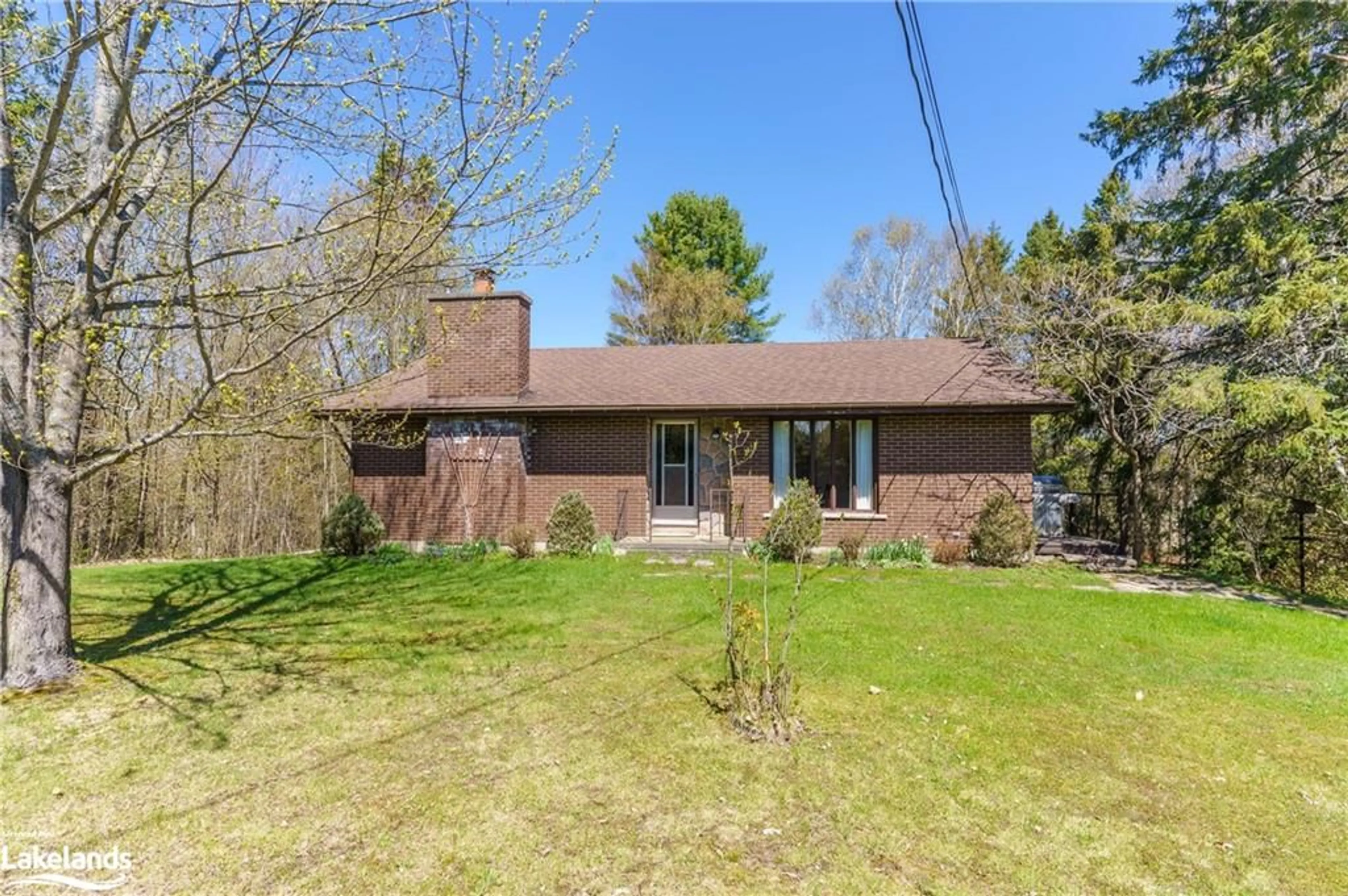 Frontside or backside of a home for 56 Hanes Rd, Huntsville Ontario P1H 1M3