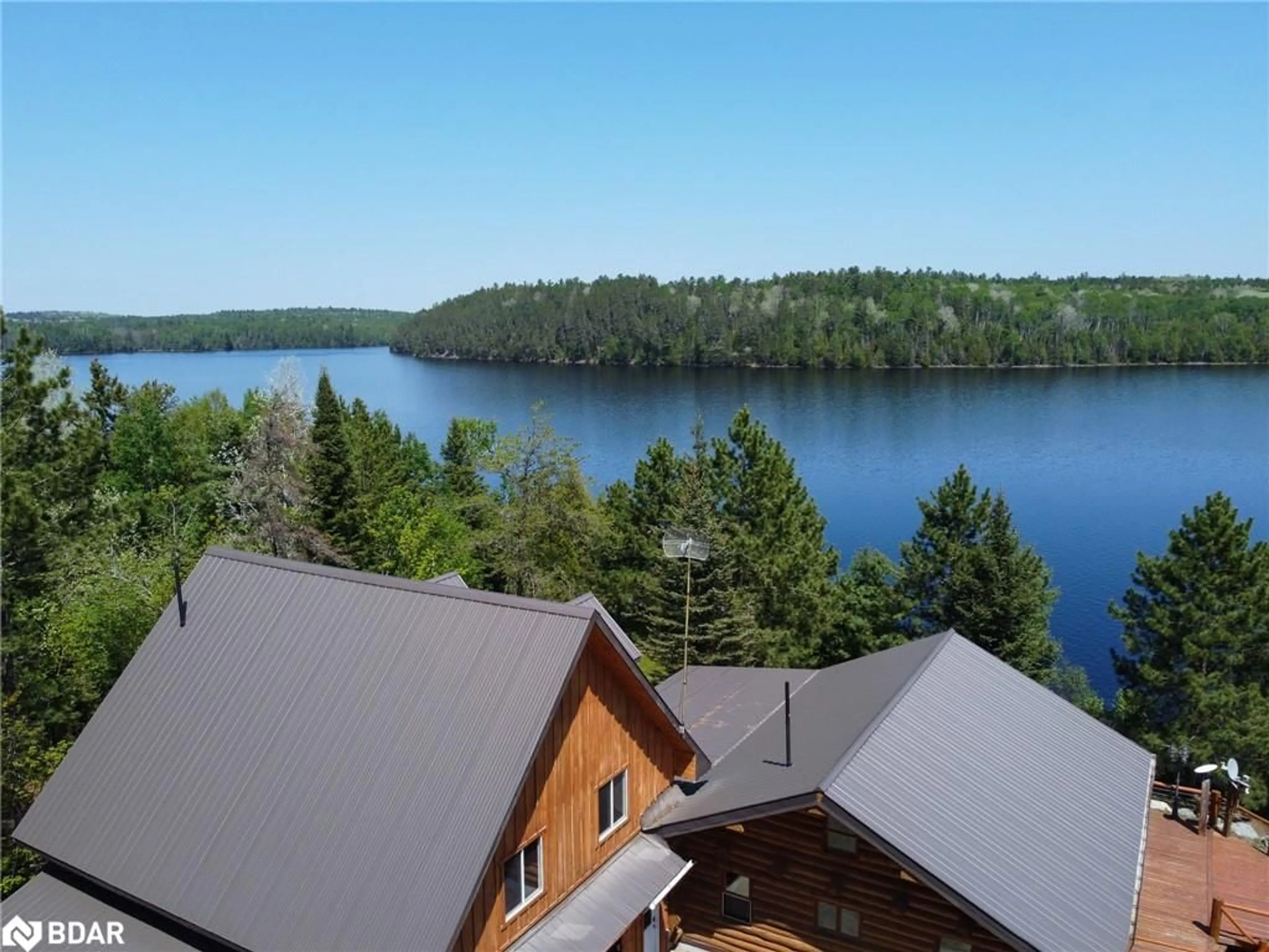 A pic from exterior of the house or condo, lake for 59 White Bear Crt, Temagami Ontario P0H 2H0